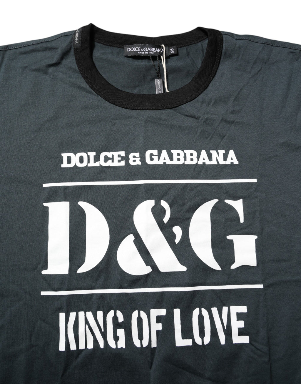 T-shirt noir en coton imprimé à manches courtes de Dolce & Gabbana, style élégant et moderne visible sur l'image.