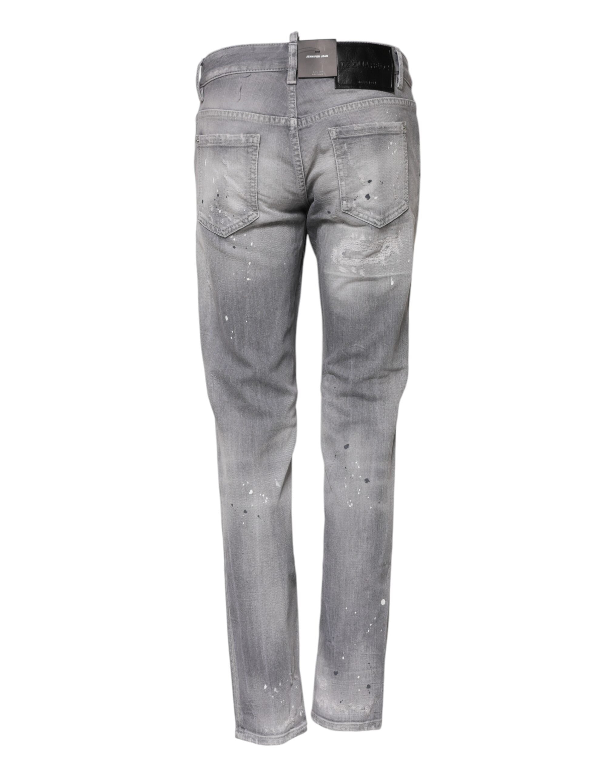 Jeans en jean gris délavé, taille moyenne, coupe tapered, de la marque Dsquared², visibles en détail.