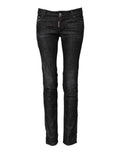 Jeans slim en denim noir à taille basse de Dsquared², coupe skinny et coton, visibles sur l'image.
