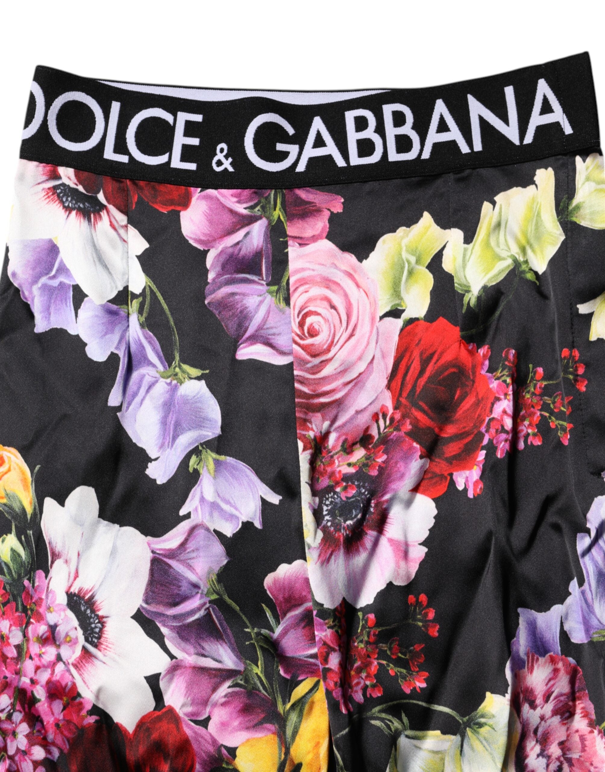 Leggings Dolce & Gabbana à fleurs multicolores, extensibles avec taille élastique, mode élégante et confortable.