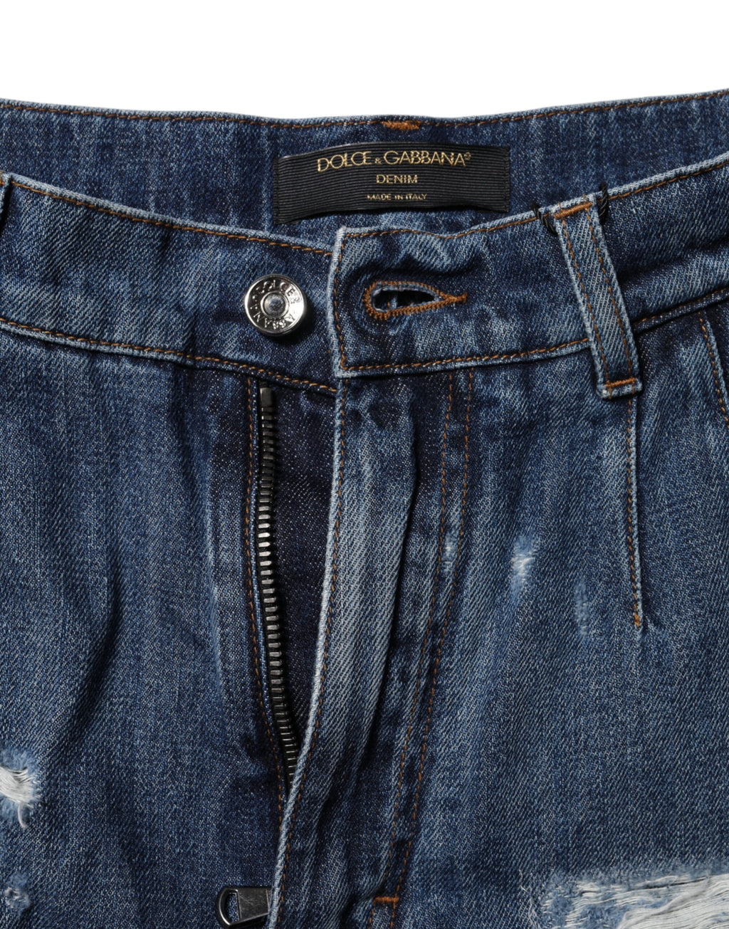 Shorts Bermuda en denim bleu déchiré en coton Dolce & Gabbana, style décontracté avec détails usés.