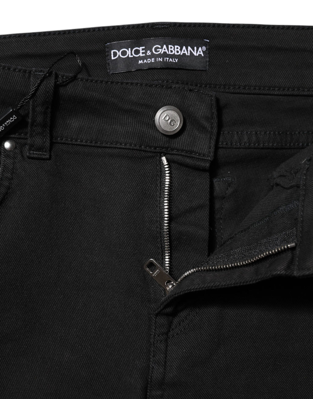 Jeans skinny en coton noir de Dolce & Gabbana avec taille mi-haute, adaptées pour un style élégant et décontracté.
