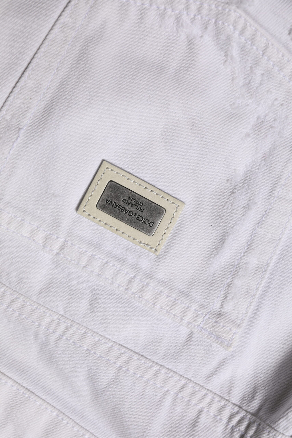 Jeans en denim blanc pour femme de taille moyenne de Dolce & Gabbana, style classique, en coton avec coupe ajustée.