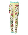 Leggings en soie jaune Dolce & Gabbana avec motif floral, ajustés et élégants, visibles en gros plan sur fond neutre.