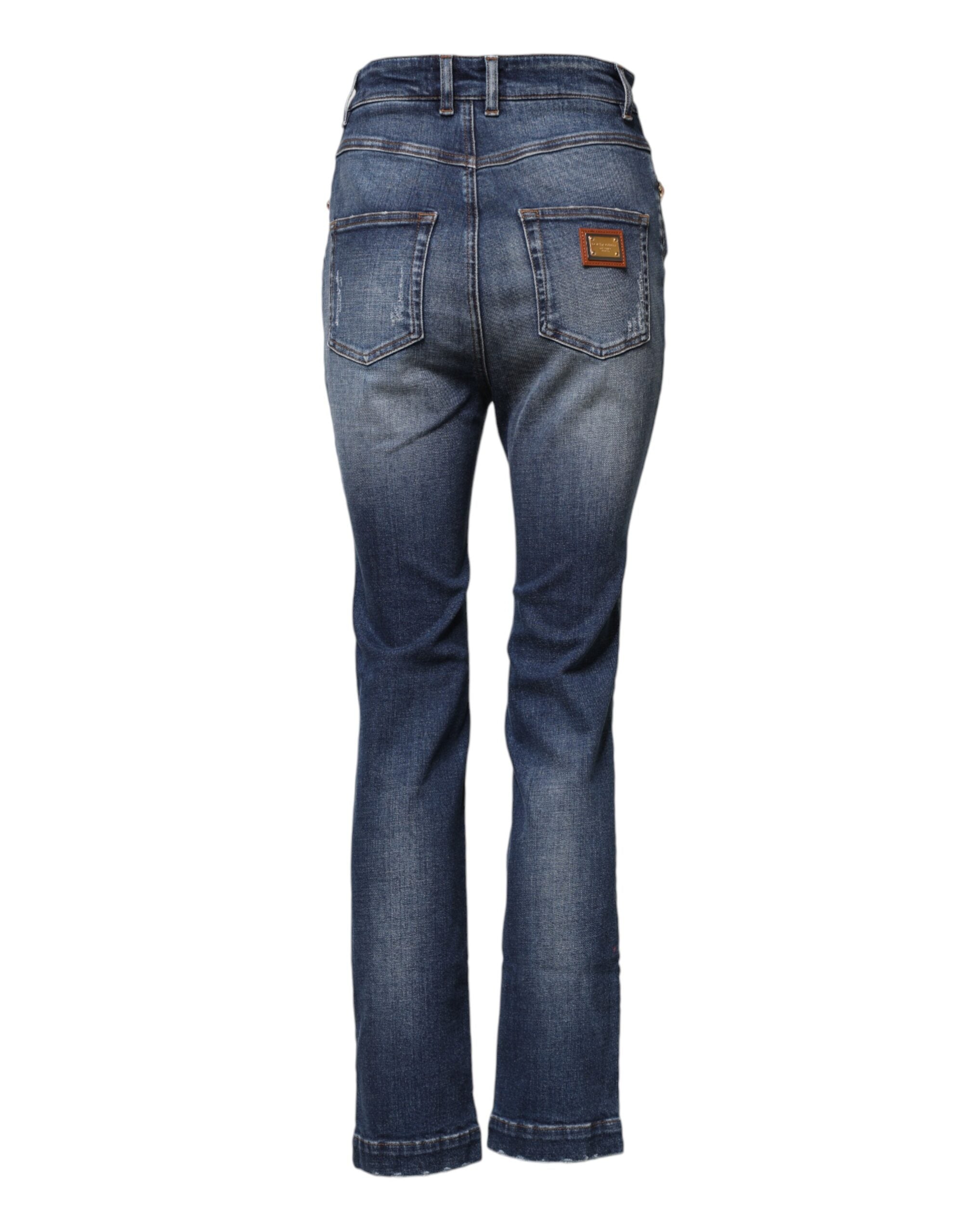Jeans en denim bleu Dolce & Gabbana ornés de strass brillants et embellissements en strass, mode élégante et tendance.