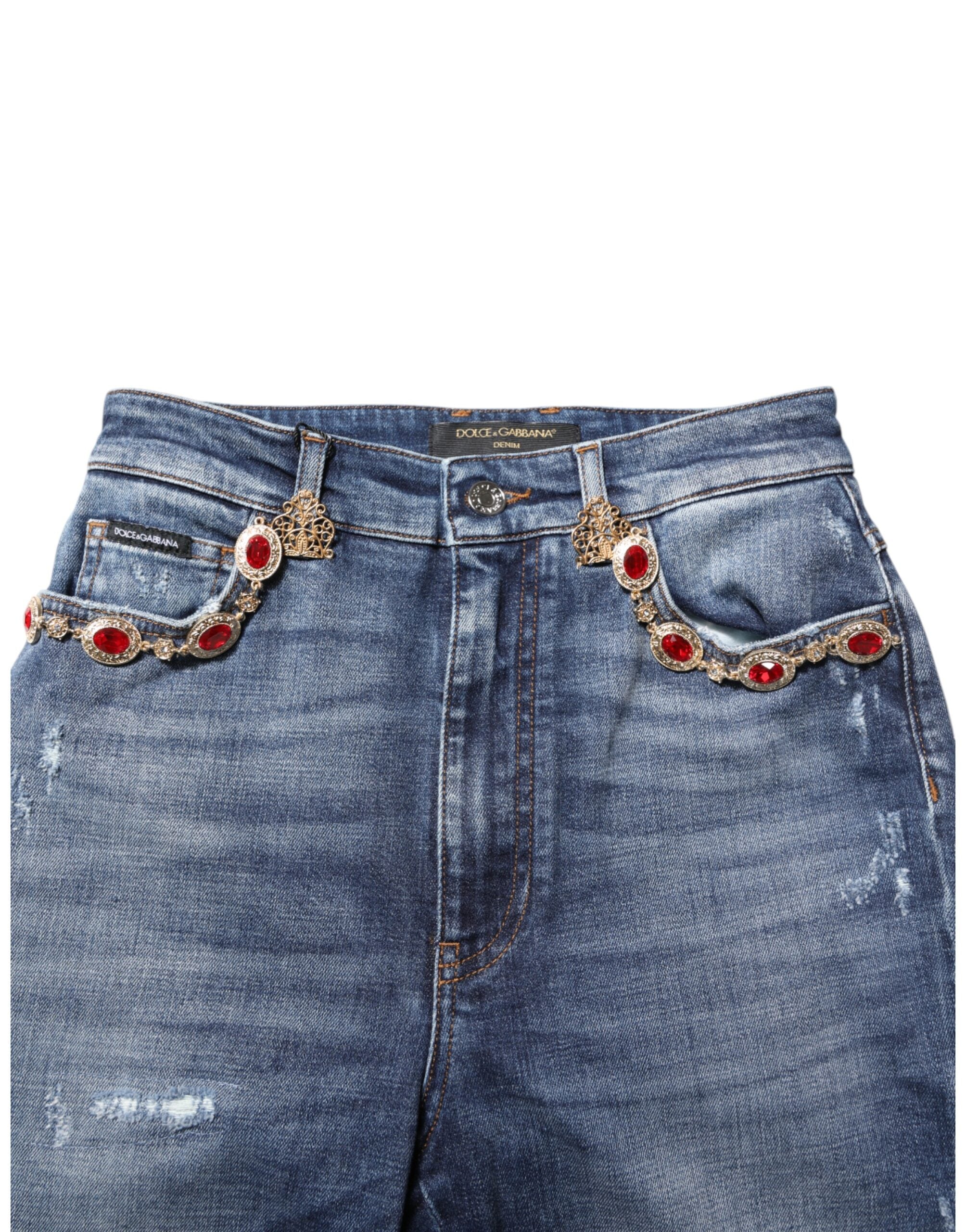 Jeans en denim bleu Dolce & Gabbana ornés de strass scintillants et embellissements en rhinestones, style élégant et tendance.