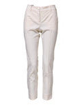 Pantalons en laine blanche Dolce & Gabbana à taille haute et coupe tapered, affichant un style élégant et moderne.