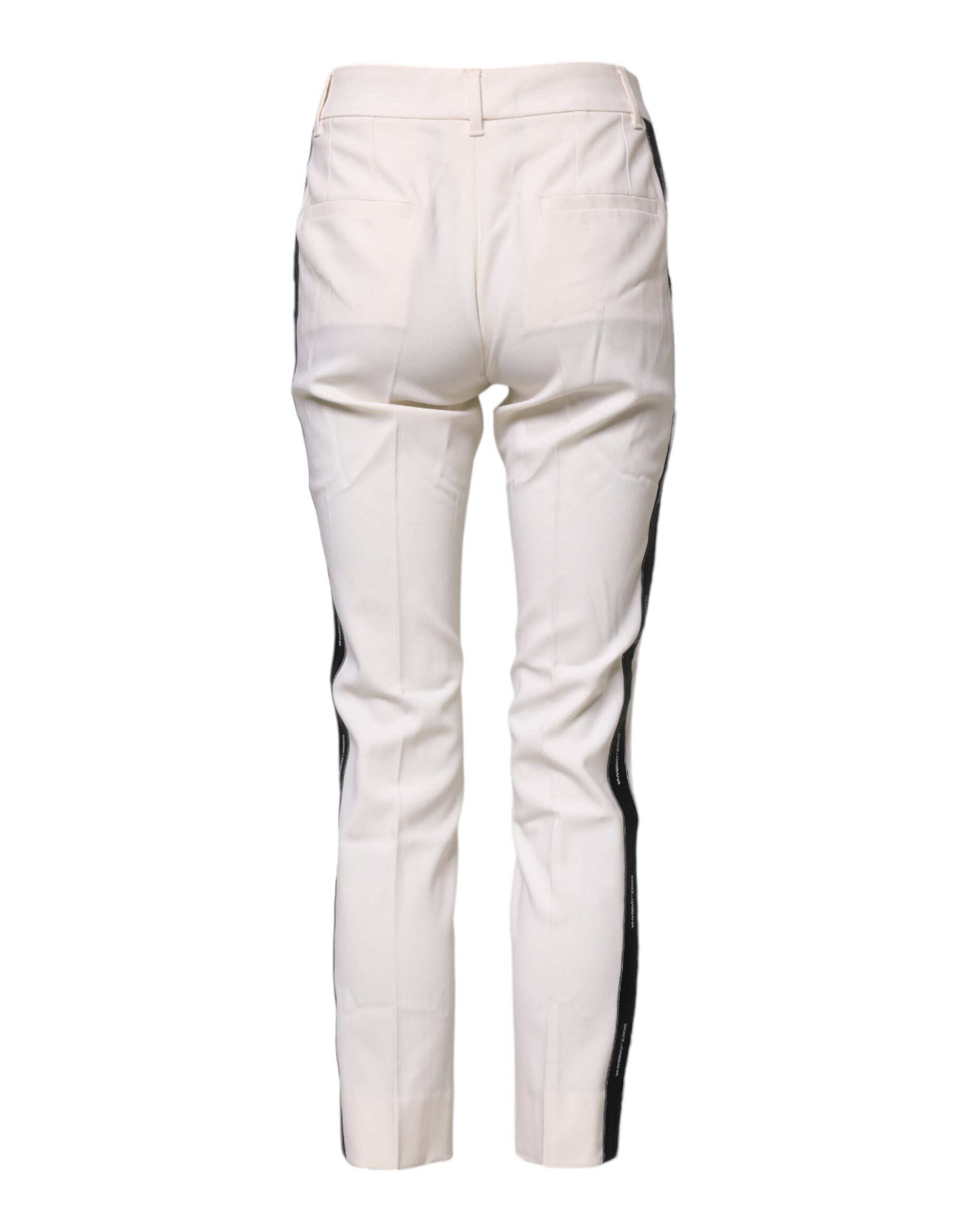 Pantalon en laine blanche Dolce & Gabbana à taille haute et coupe tapered, vue de face sur un fond neutre.