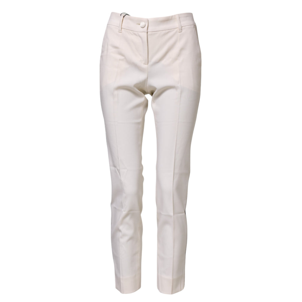 Pantalon blanc en laine Dolce & Gabbana, coupe tapered à taille haute, avec ceinture élégante et finition raffinée.
