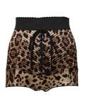 Shorts Dolce & Gabbana en cuir marron avec motif léopard à taille haute, mode élégante et tendance.
