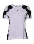 T-shirt blanc Dolce & Gabbana avec détails en dentelle florale et broderies DG, vue de face.