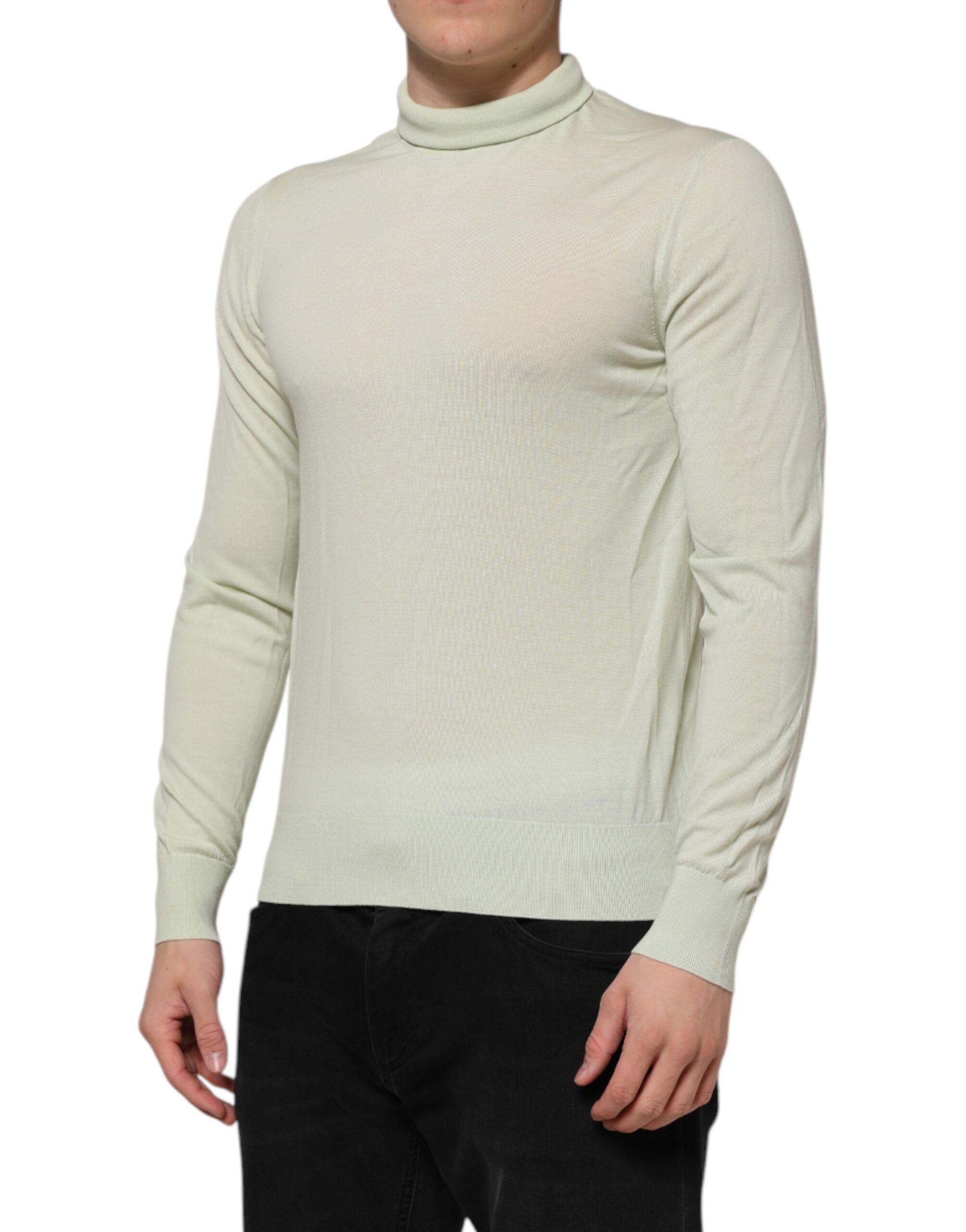 Pull en laine vert menthe Dolce & Gabbana à col roulé, vue de face, détails du tissu et coupe élégante visible.