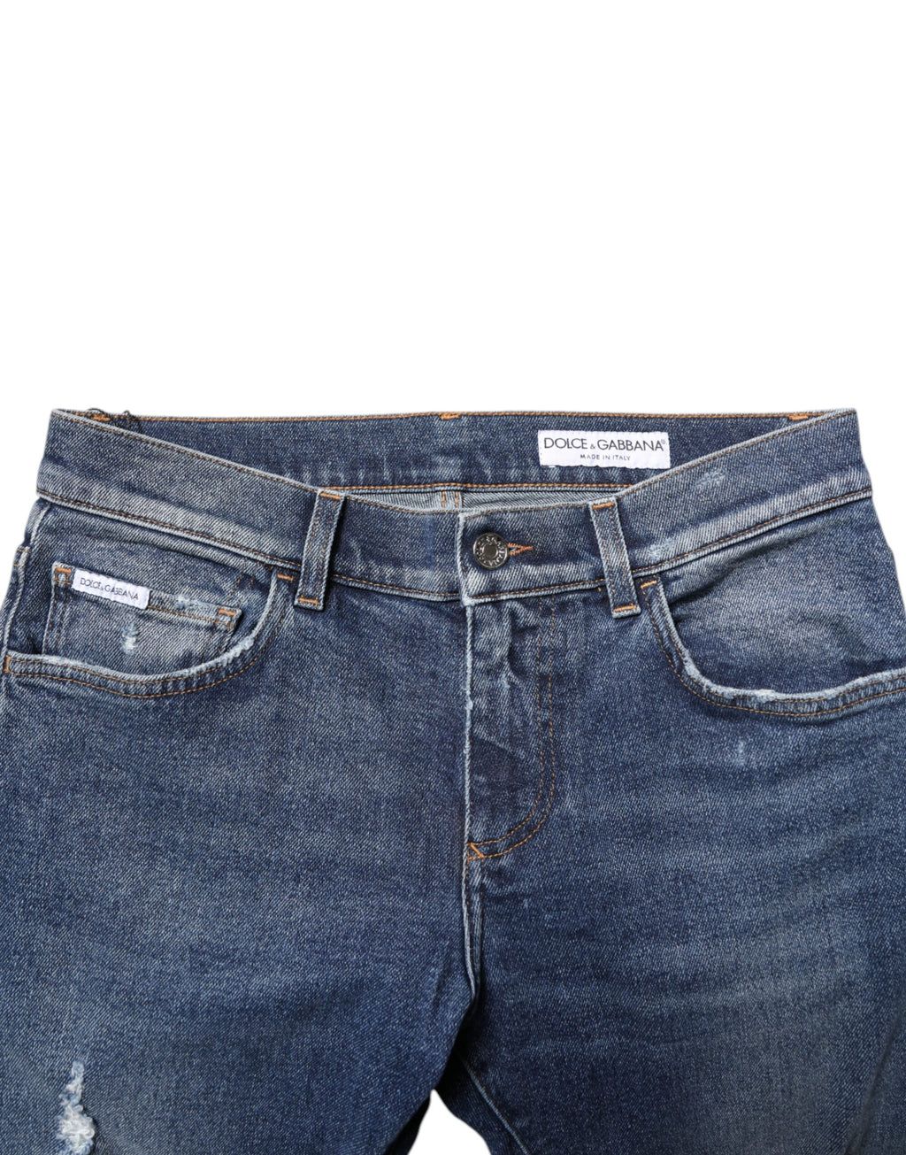 Jeans skinny en denim tacheté bleu Dolce & Gabbana, en coton délavé avec des détails effilochés.
