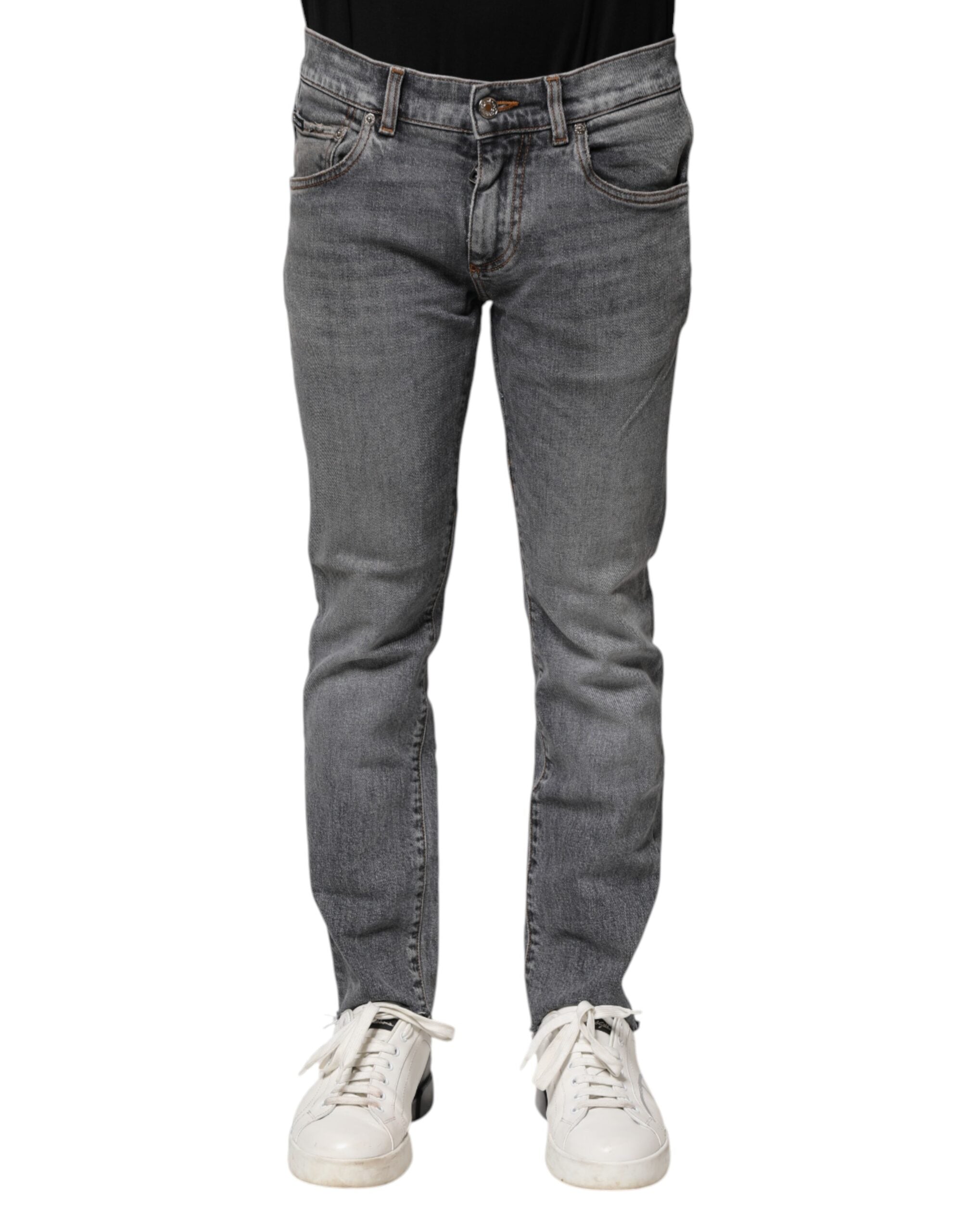 Pantalon jean skinny en coton gris de Dolce & Gabbana, coupe ajustée et style moderne visible sur l'image.