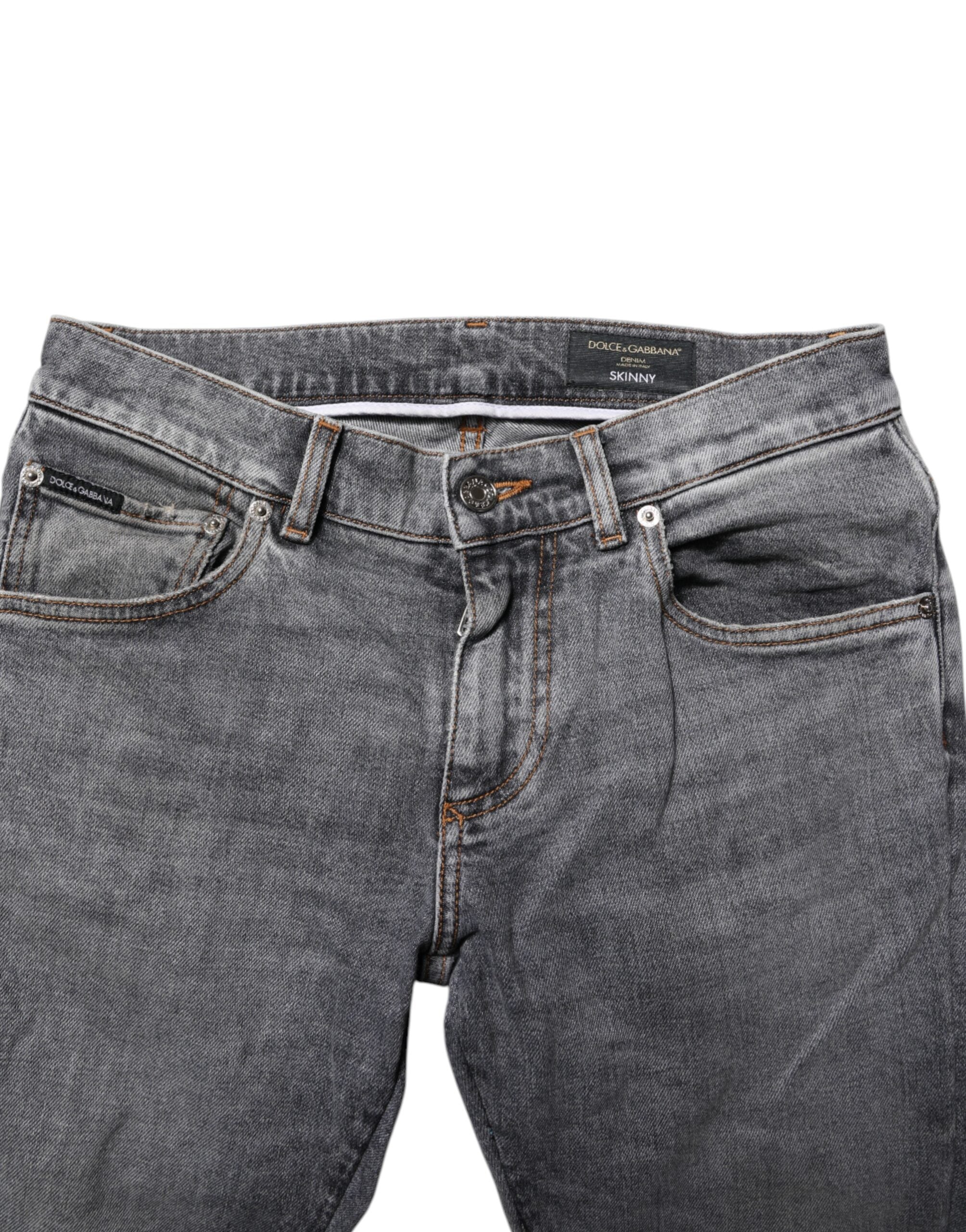 Pantalon jean slim en coton gris de Dolce & Gabbana, coupe skinny, vue de face avec détails de la texture du tissu.