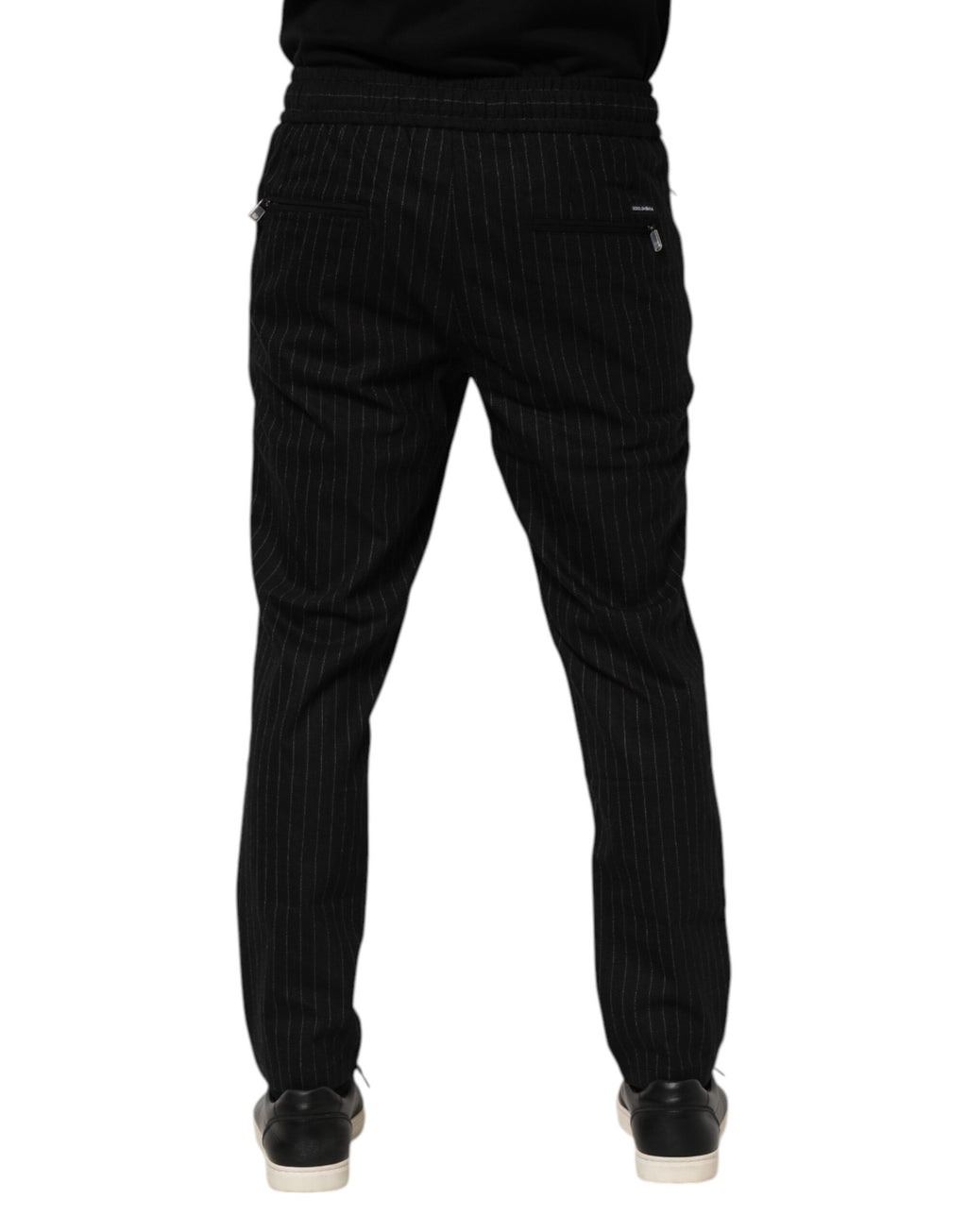 Pantalons joggers pour homme en laine noire à rayures de Dolce & Gabbana, style décontracté et élégant.
