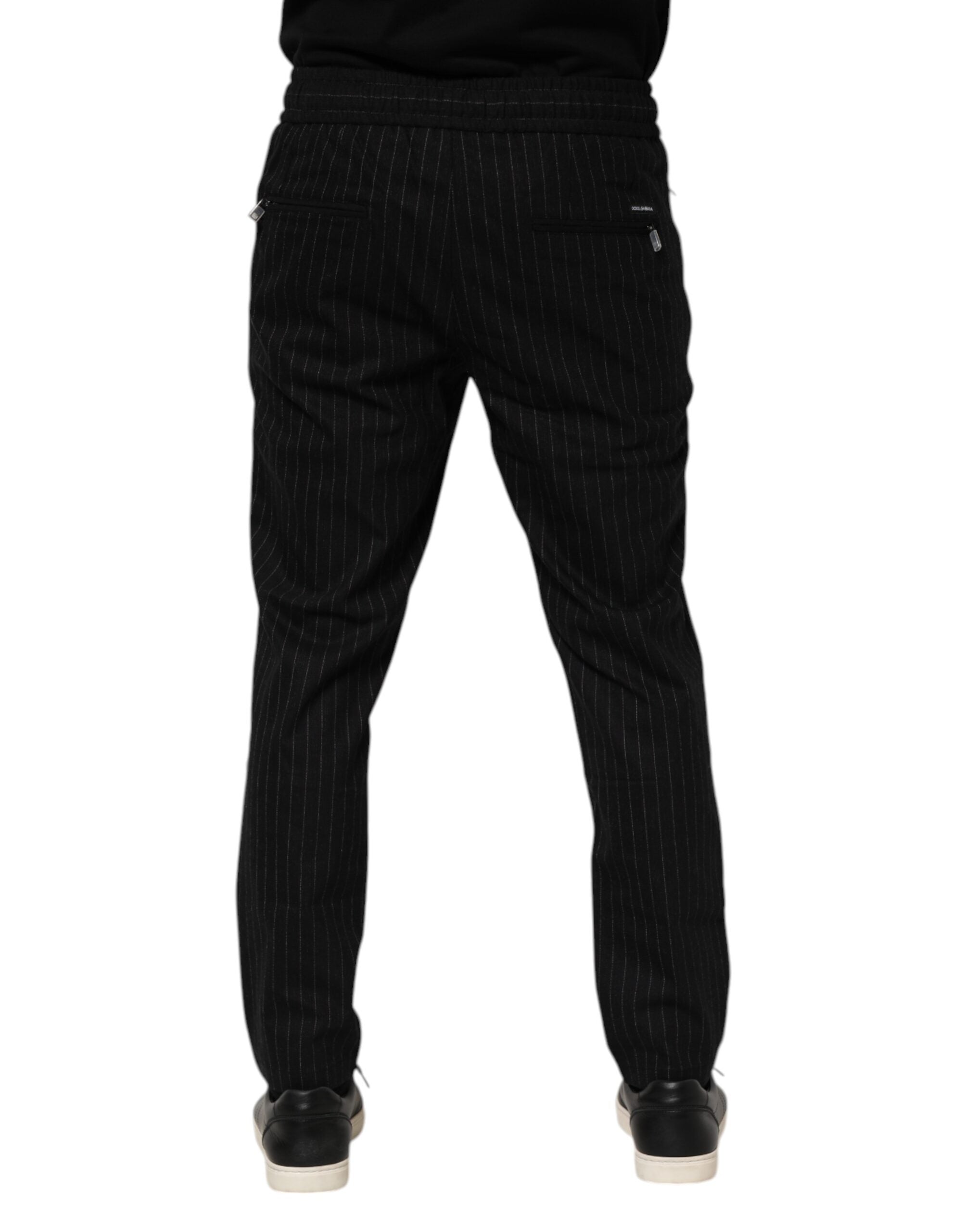 Pantalons joggers pour homme en laine noire à rayures de Dolce & Gabbana, style décontracté et élégant.