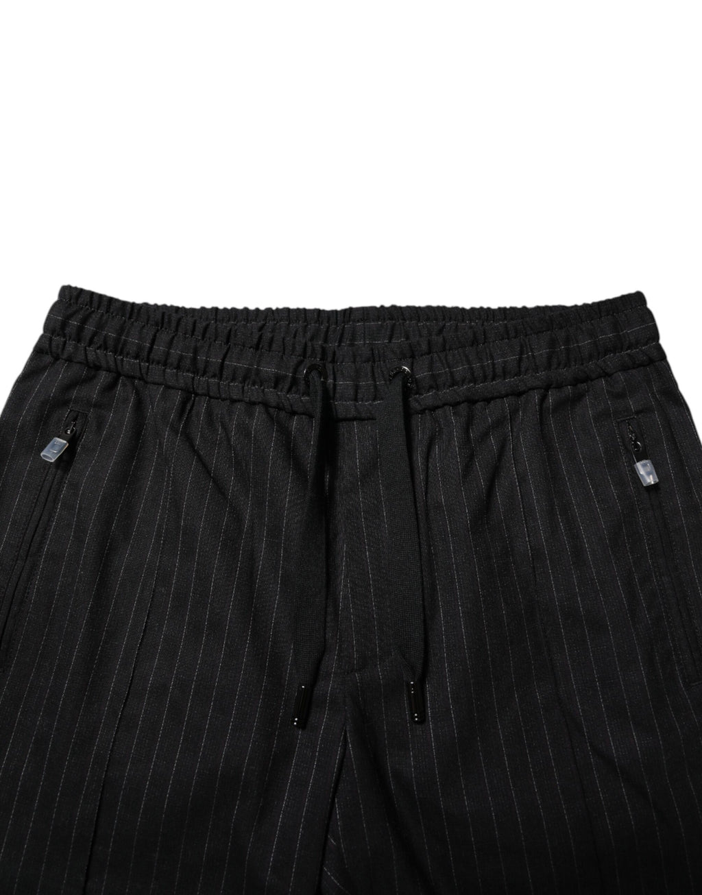 Pantalons jogger pour homme en laine noire à rayures, de la marque Dolce & Gabbana, affichant un style décontracté et élégant.