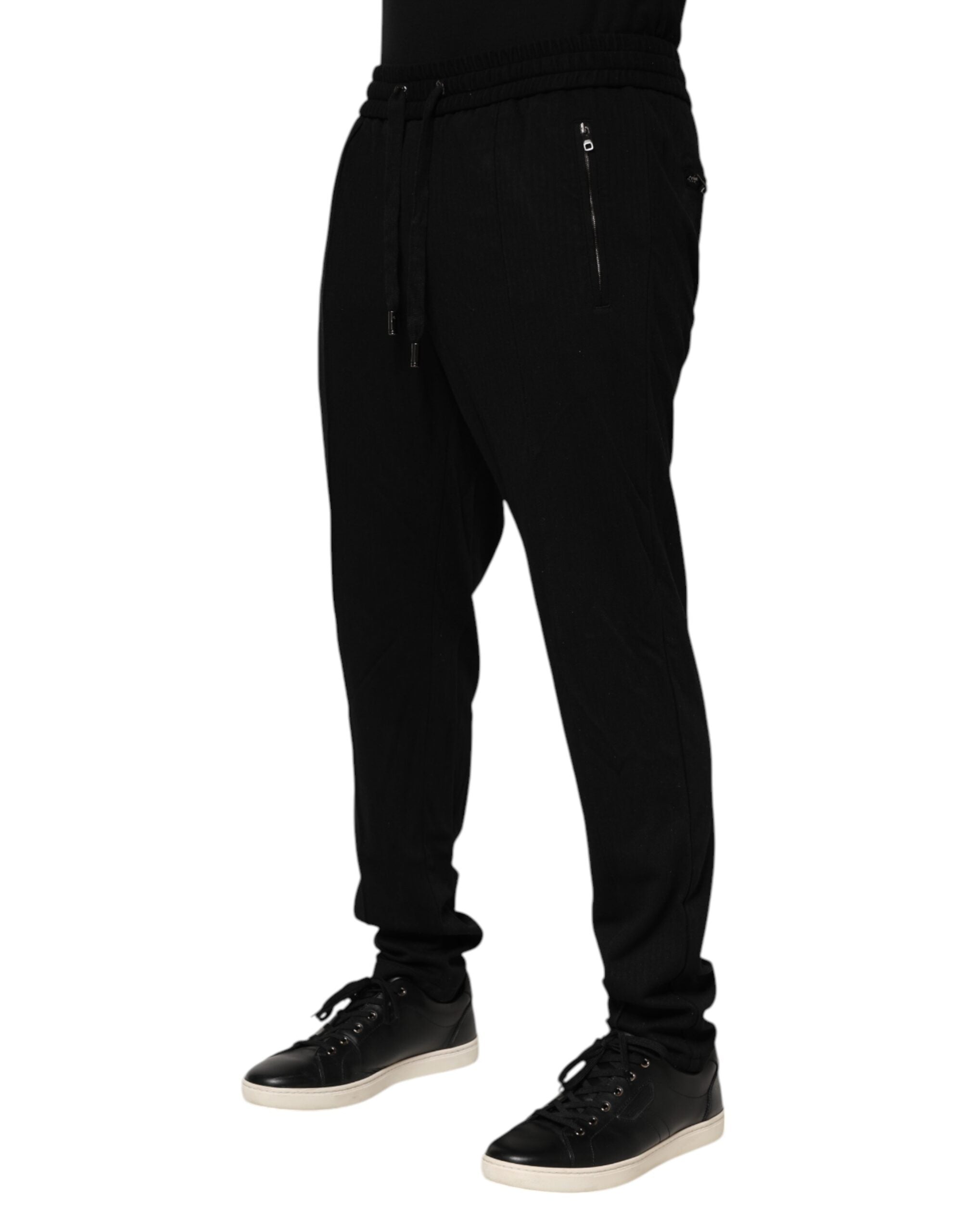 Pantalons jogger skinny noirs en viscose pour homme de Dolce & Gabbana avec logo visible.