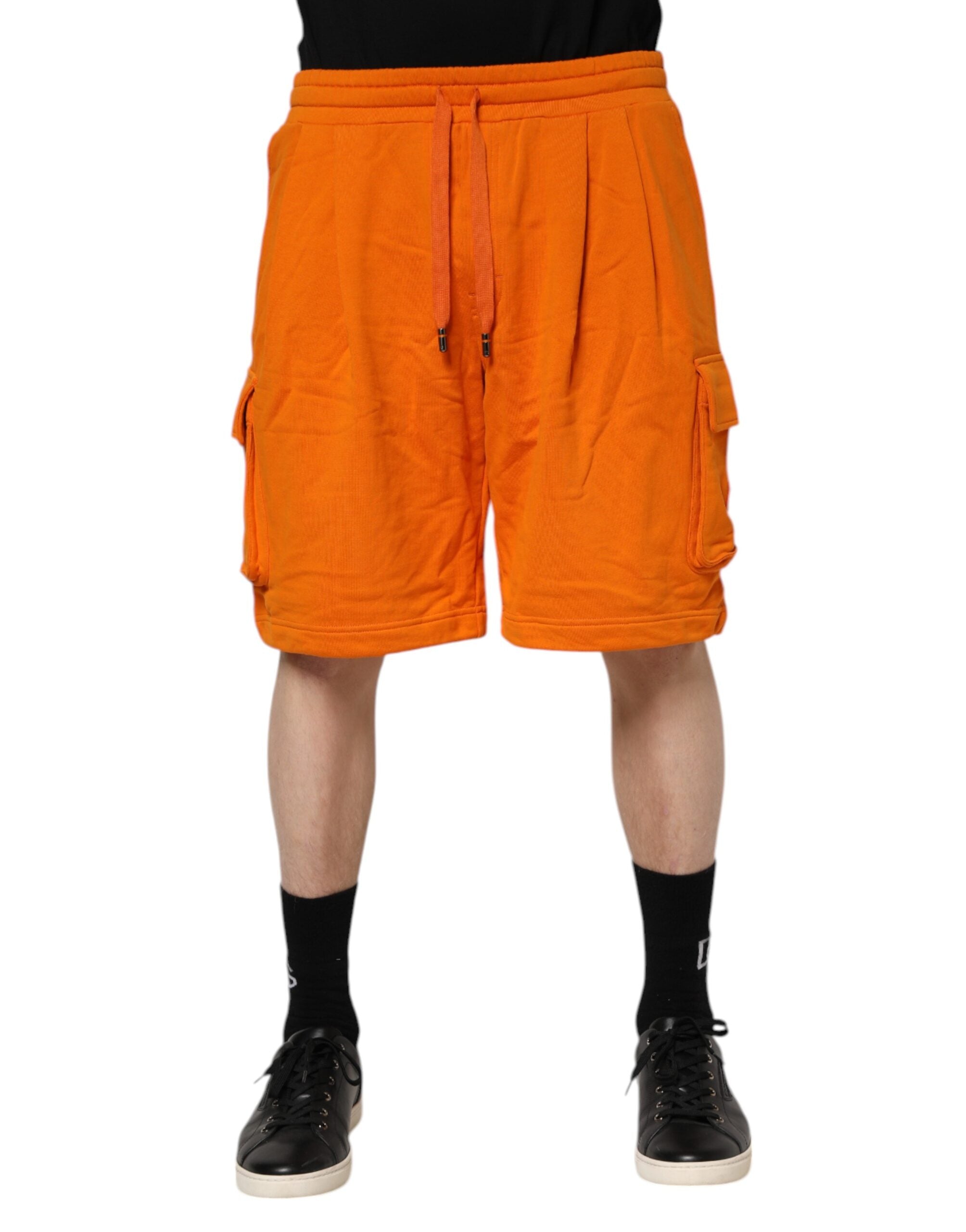 Shorts bermuda décontractés en coton orange pour hommes de Dolce & Gabbana, avec poches cargo et style casual.