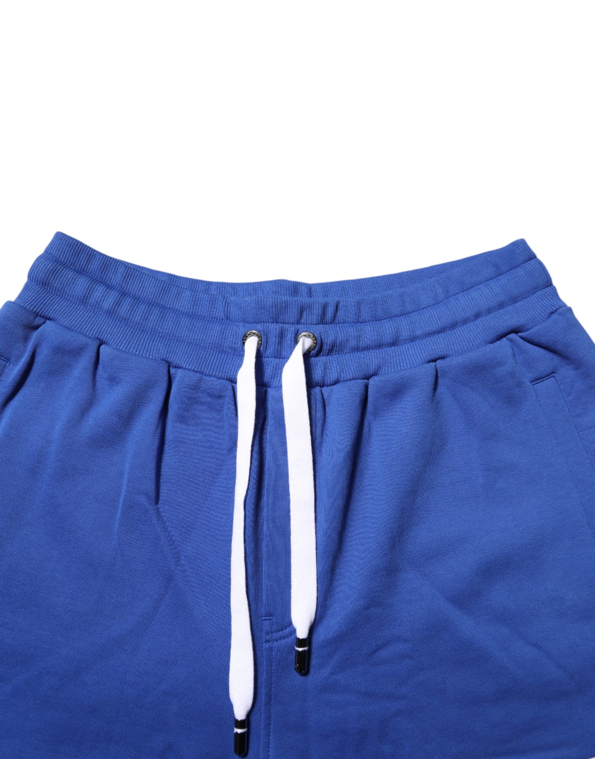 Shorts bermuda en coton Dolce & Gabbana avec logo bleu, style décontracté et confortable, adaptés pour un look estival.