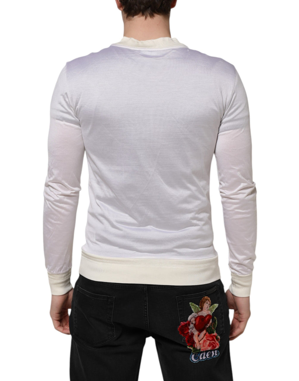 T-shirt blanc en soie Dolce & Gabbana à col rond et manches longues, élégante et raffinée, vue de face.