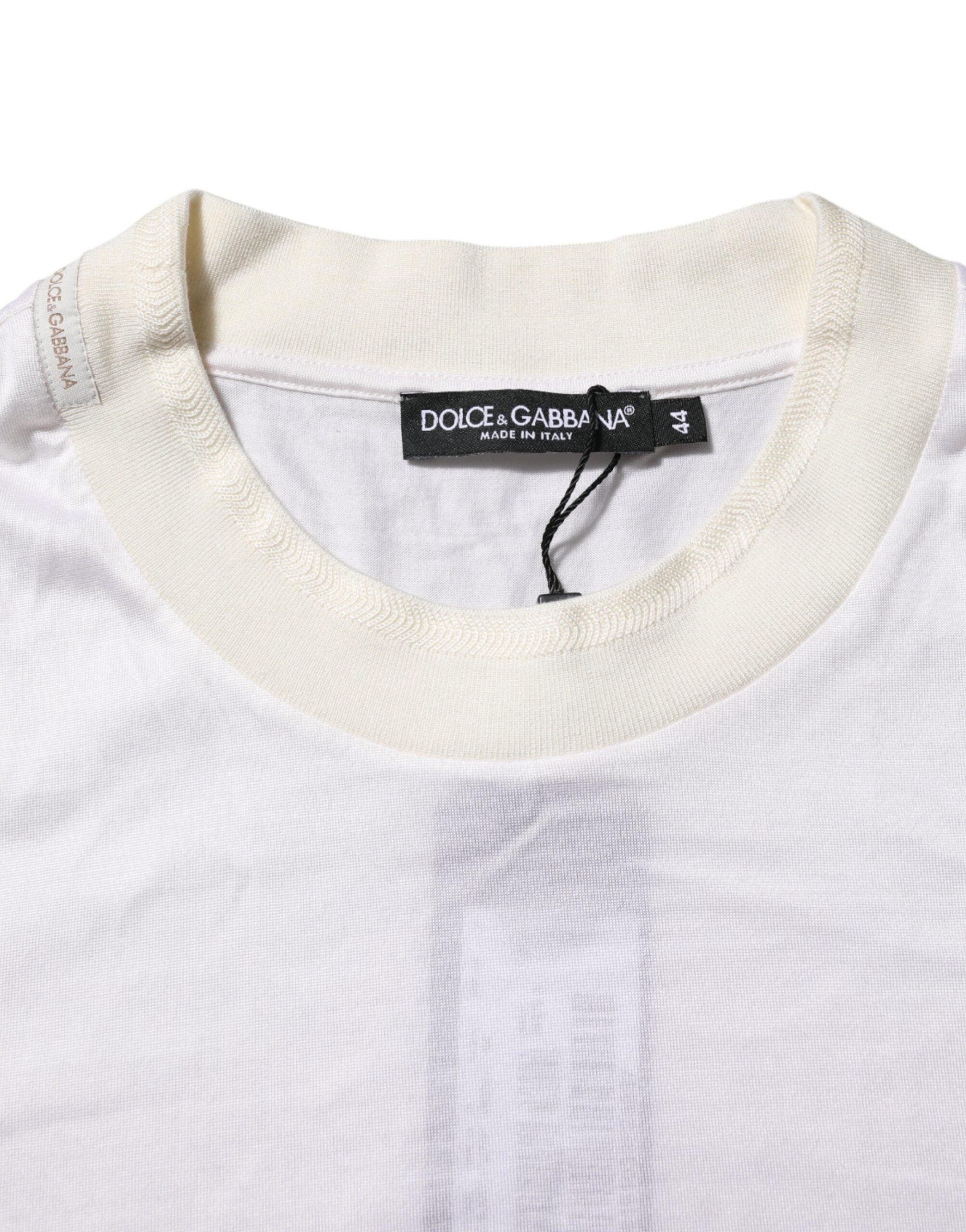 T-shirt en soie blanche Dolce & Gabbana à manches longues et col rond, élégante et douce, vue de face.