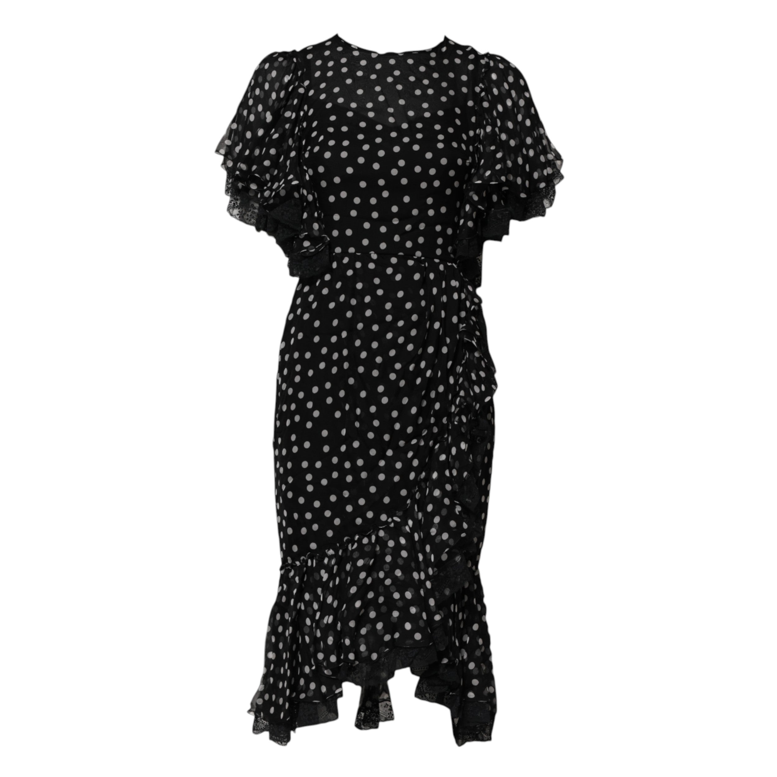 Robe en chiffon noir et blanc à pois en dentelle Dolce & Gabbana, élégante et fluide, avec détails sophistiqués.