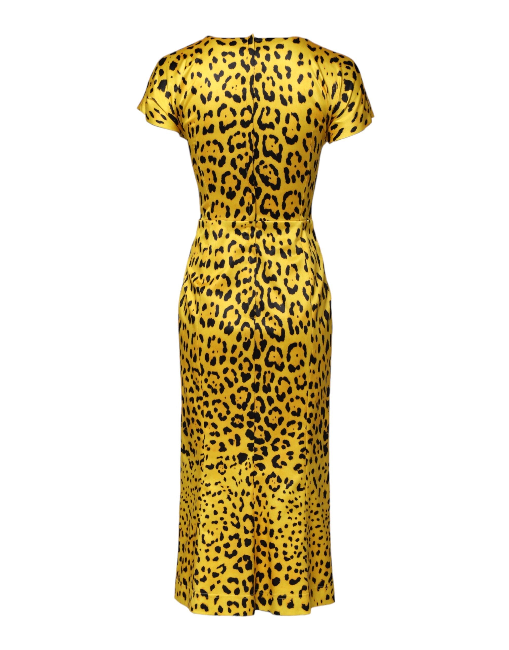 Robe midi Dolce & Gabbana en polyester jaune avec motif léopard, coupe moulante et élégante.