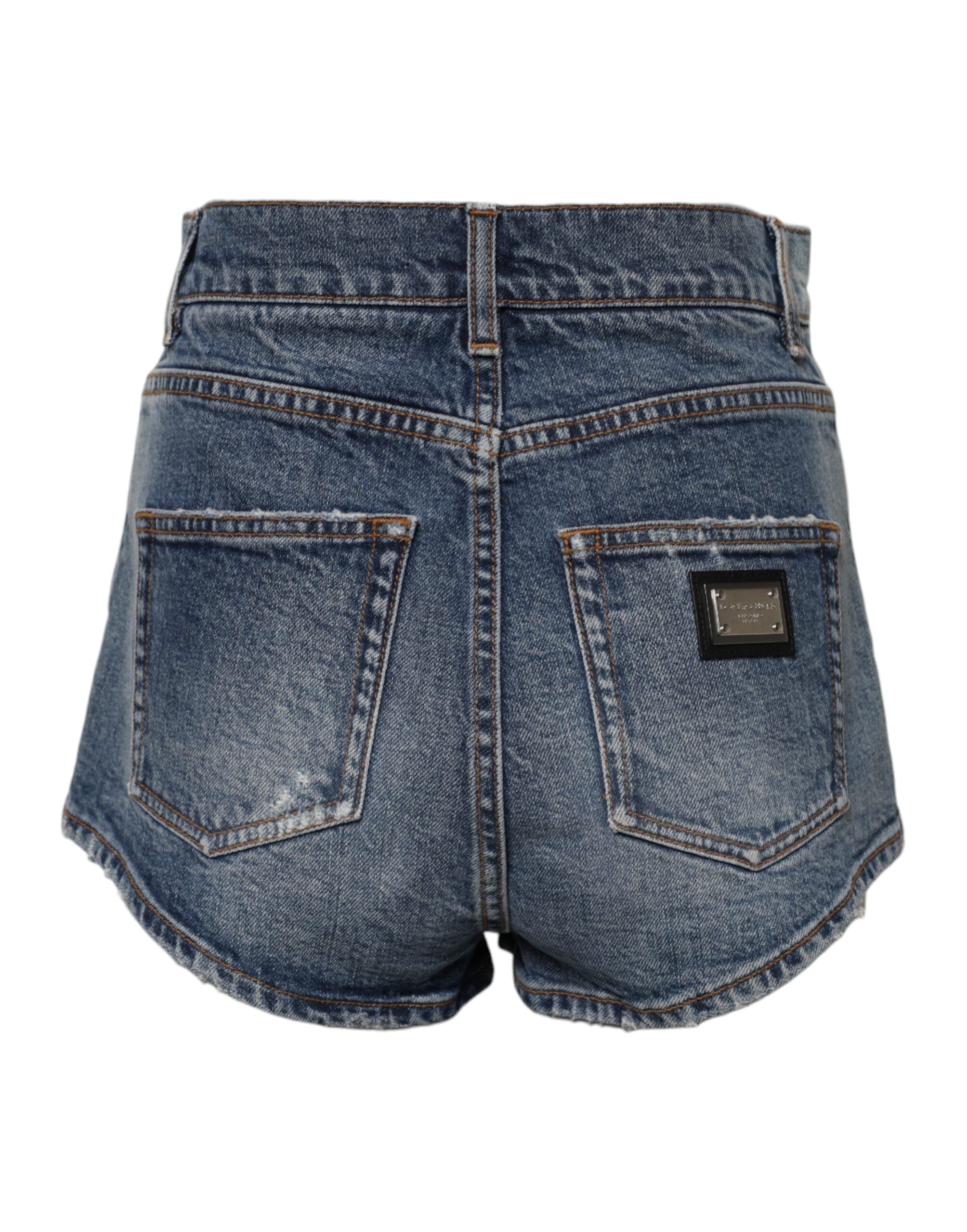 Shorts en denim coton déchiré Dolce & Gabbana, pantalons courts bleus tendance avec style décontracté.