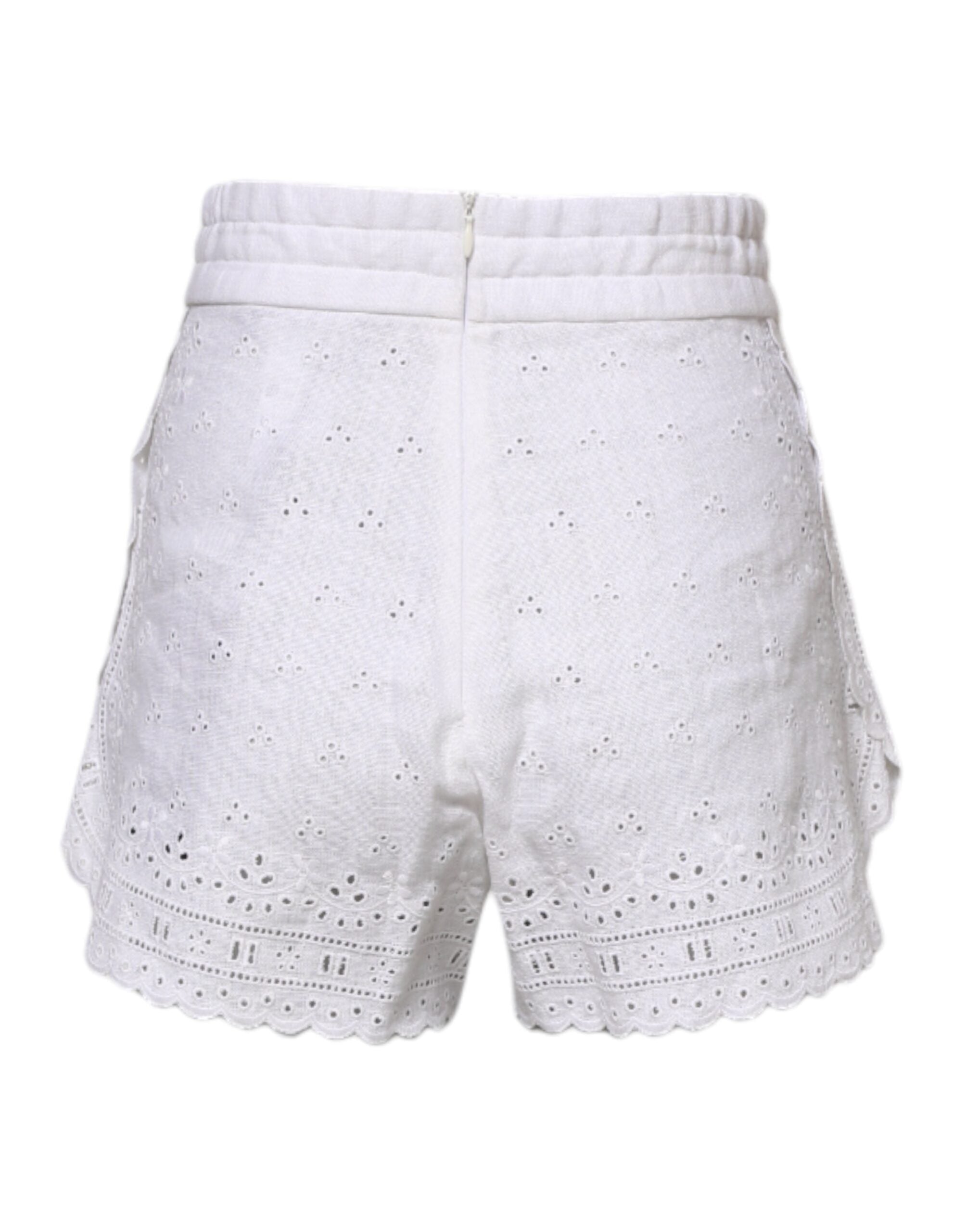 Shorts en lin blanc Dolce & Gabbana à taille haute, mode estivale élégante avec détails sophistiqués.