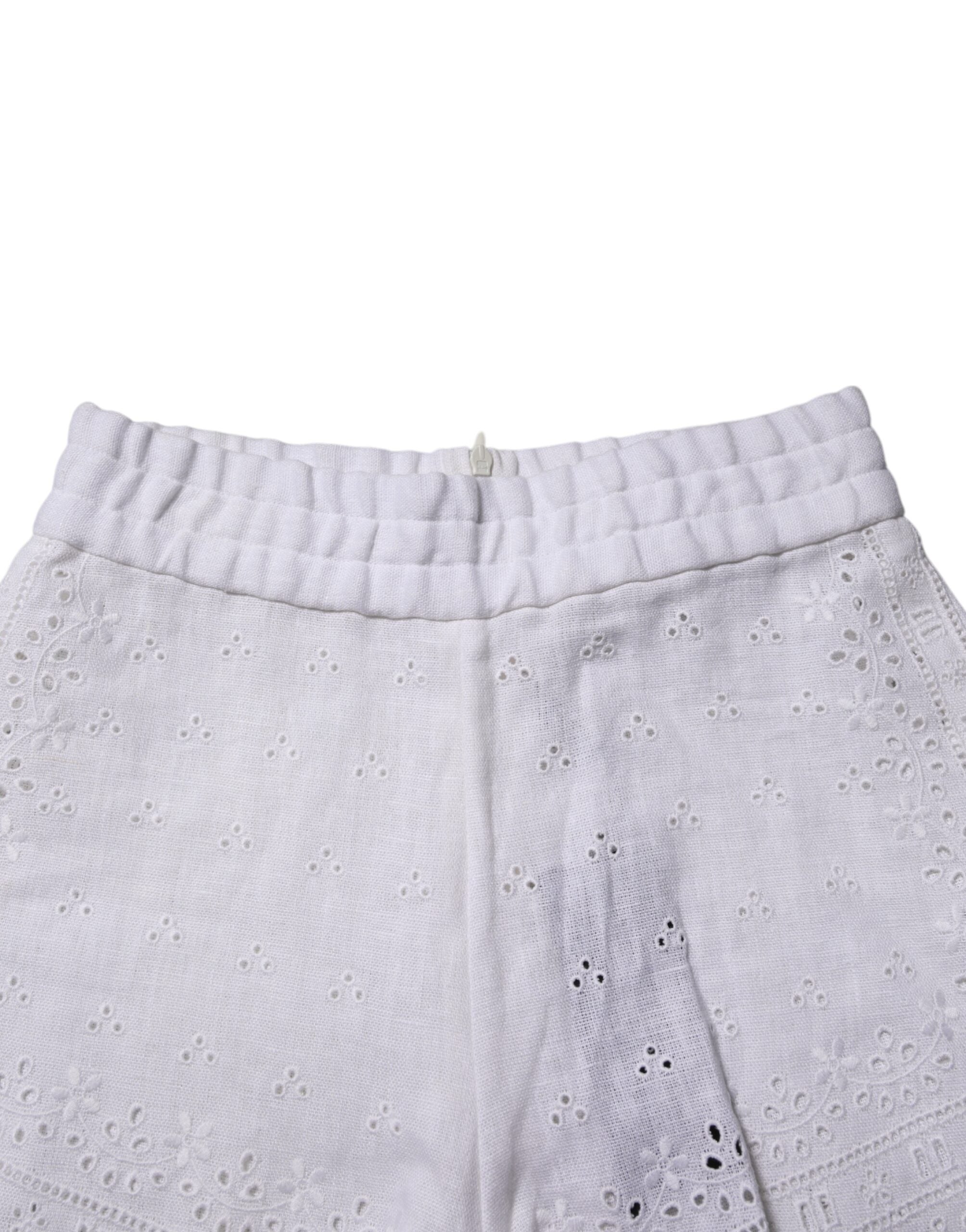 Shorts Dolce & Gabbana en lin blanc à taille haute, style élégant et décontracté, parfait pour l'été et les looks estivaux.