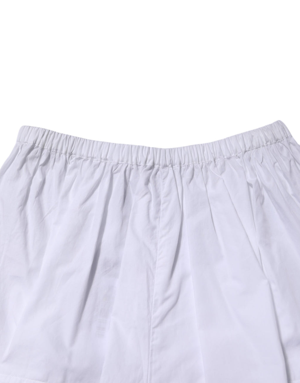 Shorts en coton blanc à taille haute avec panneaux en dentelle, marque Dolce & Gabbana.