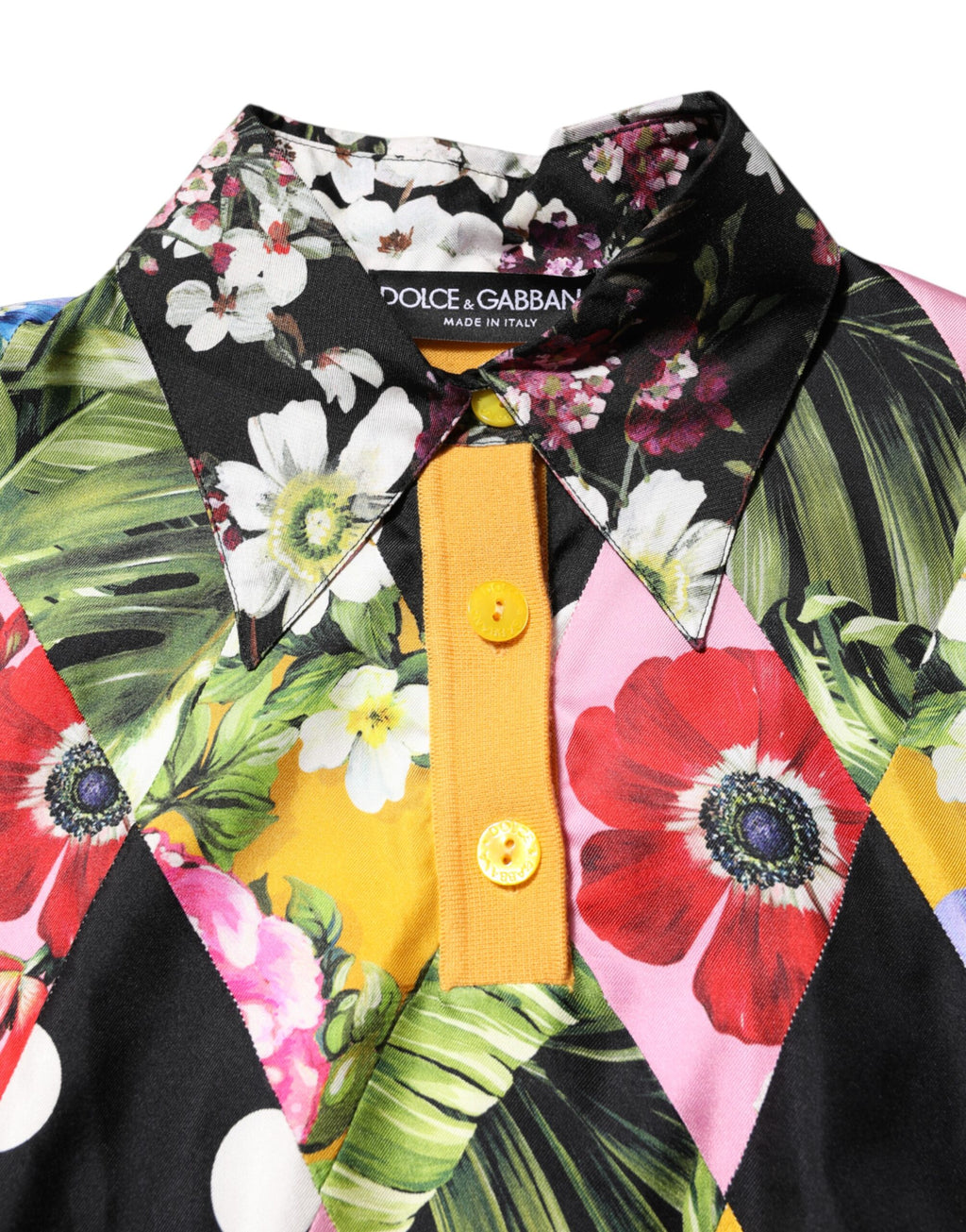 Polo à manches longues Dolce & Gabbana avec motif floral multicolore, tissu léger et design élégant.