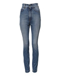 Jeans en denim bleu délavé Dolce & Gabbana, coupe skinny taille haute, visibles avec détails de couture et boutons.