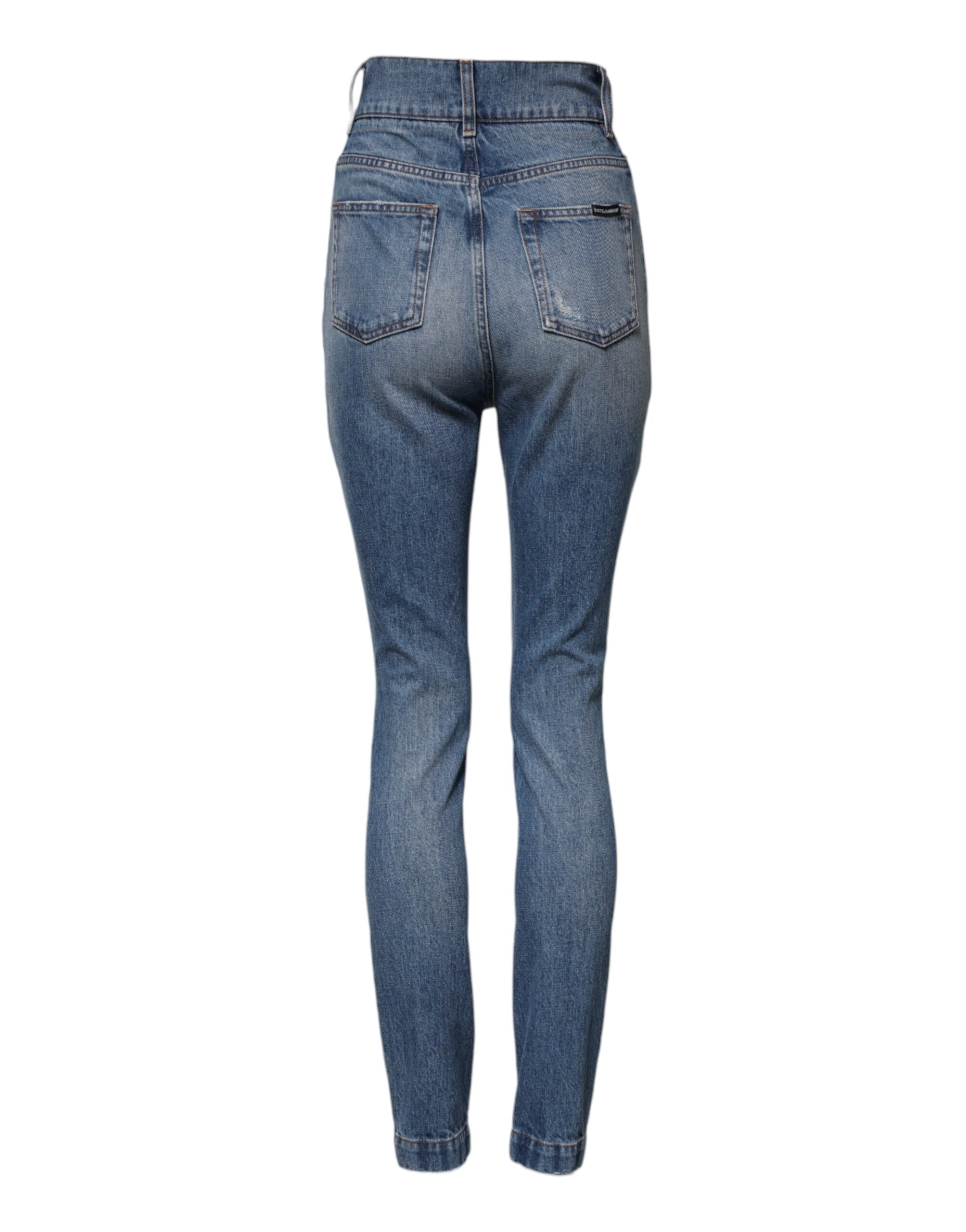 Jeans slim bleu délavé à taille haute de Dolce & Gabbana, ajustés, avec coutures visibles et poches avant.