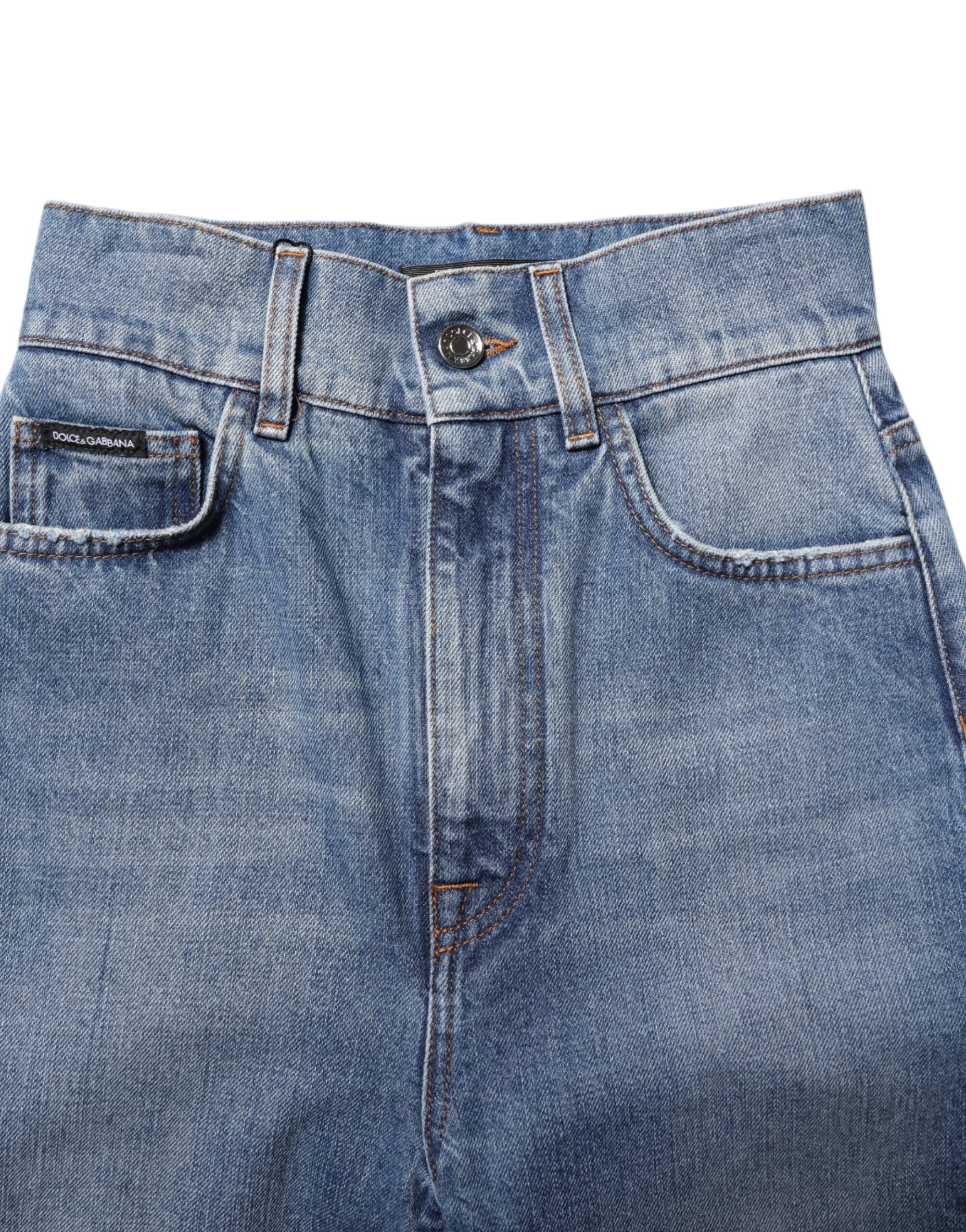 Jeans en denim skinny à taille haute Dolce & Gabbana, bleu délavé, ajustés et tendance, visibles en gros plan.