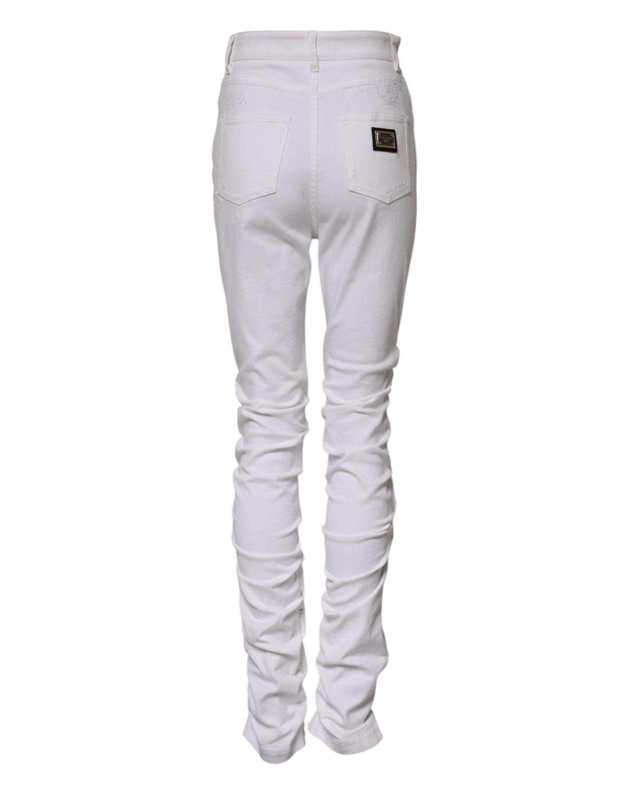 Jeans en denim blanc Dolce & Gabbana à taille haute et déchirures, style décontracté et tendance, en coton.