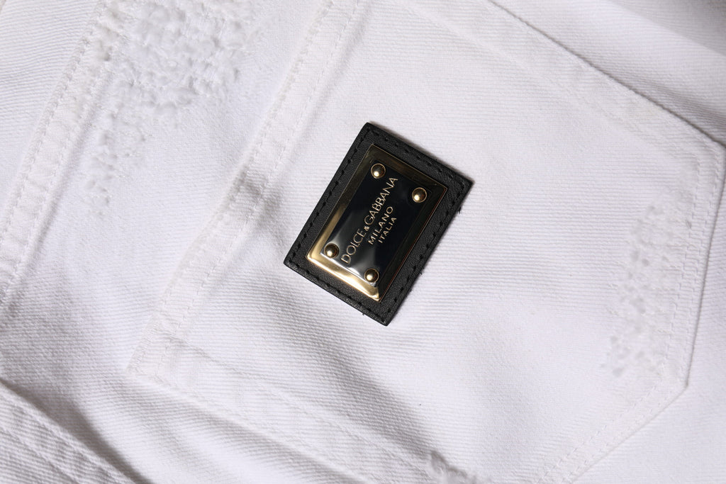 Jeans en denim blanc déchiré à taille haute de Dolce & Gabbana, style décontracté et tendance, vue de face.