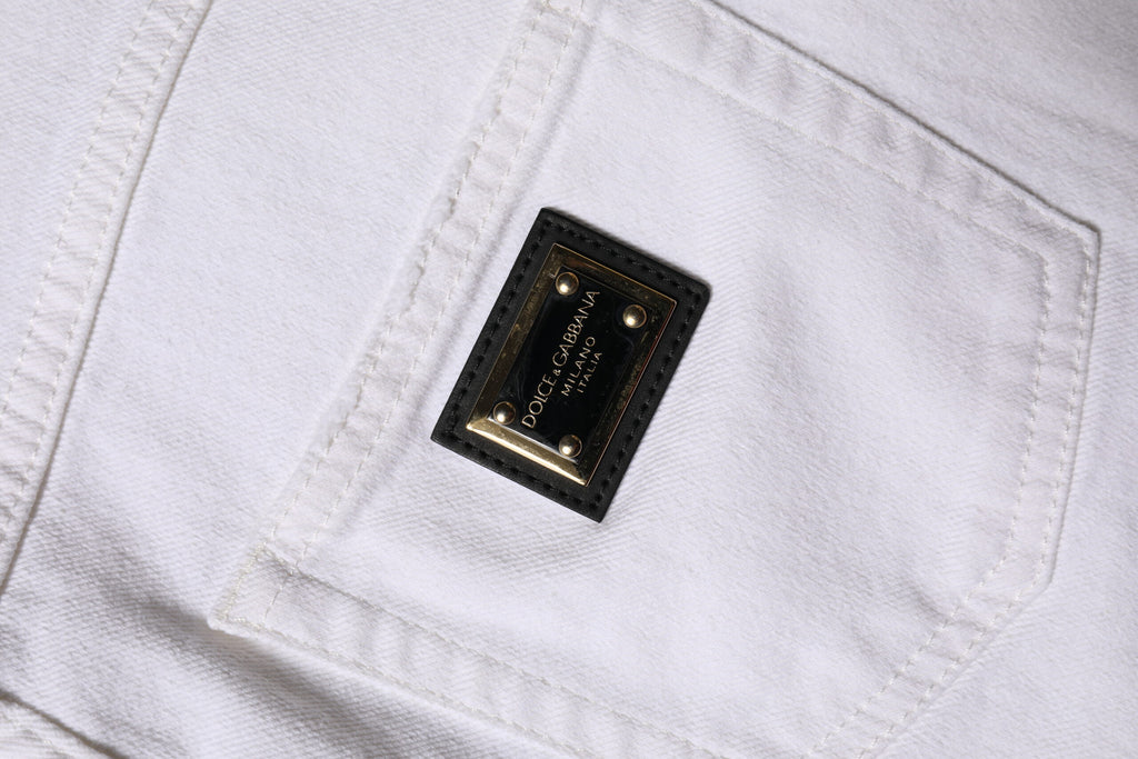 Jeans en denim blanc Dolce & Gabbana à taille haute et coupe droite, vue de face, en coton.