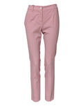 Pantalon en laine rose à taille haute et coupe tapered par Dolce & Gabbana, visible en image.