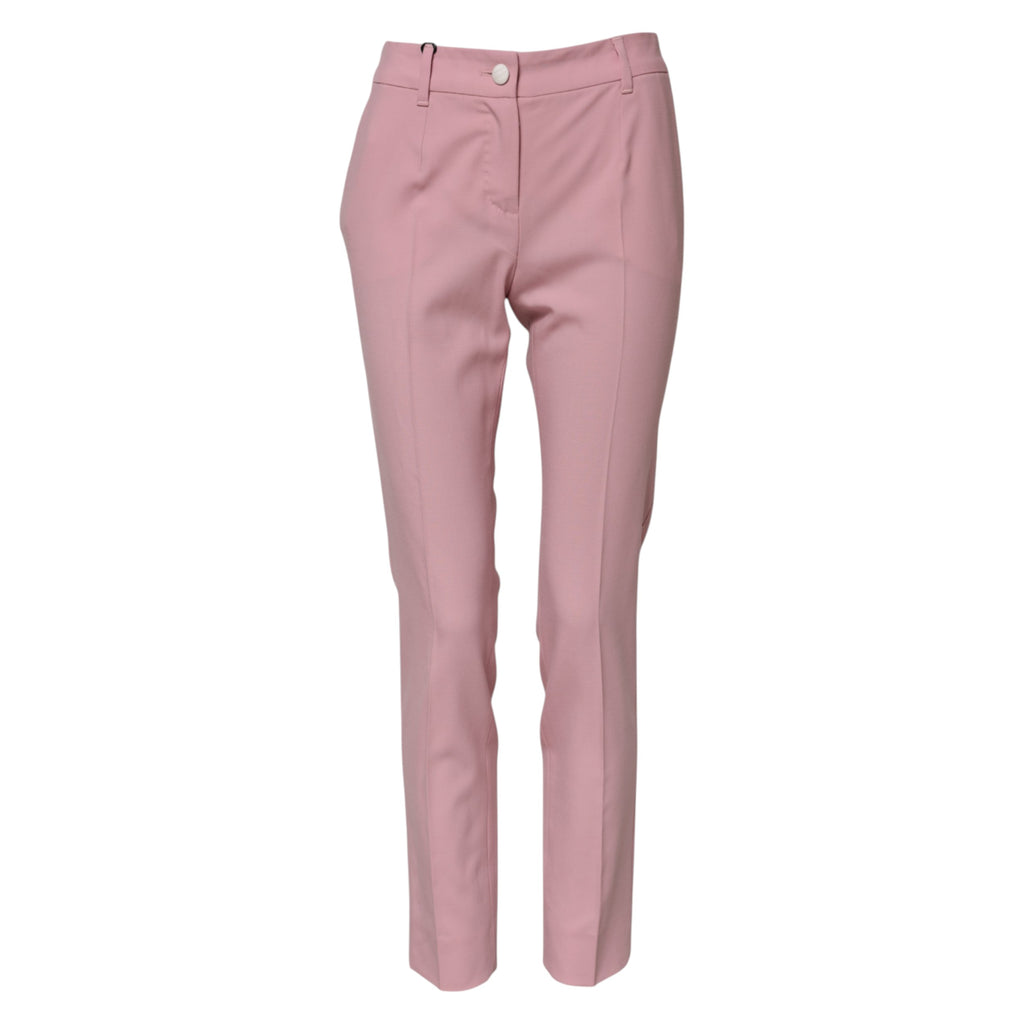 Pantalon en laine rose à taille haute et coupe tapered de Dolce & Gabbana, visible avec détails élégants et finition soignée.