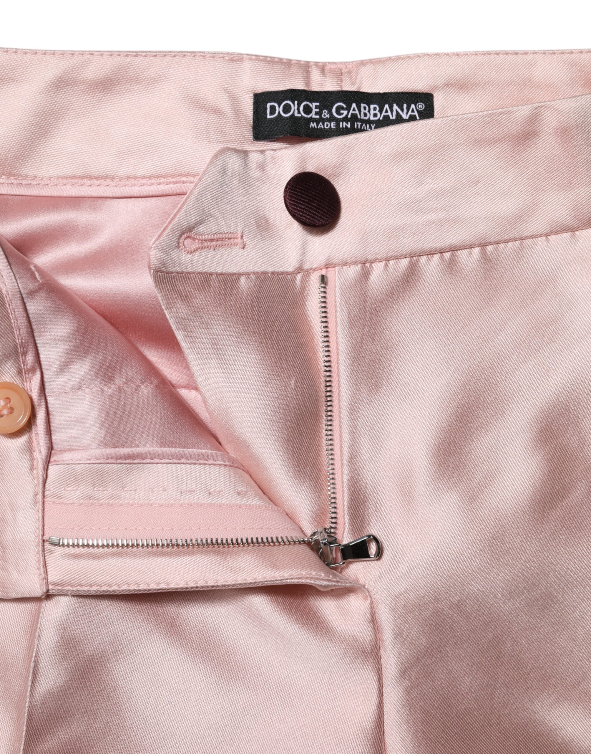 Pantalons en satin rose à taille haute et coupe tapered de Dolce & Gabbana, élégants et sophistiqués.