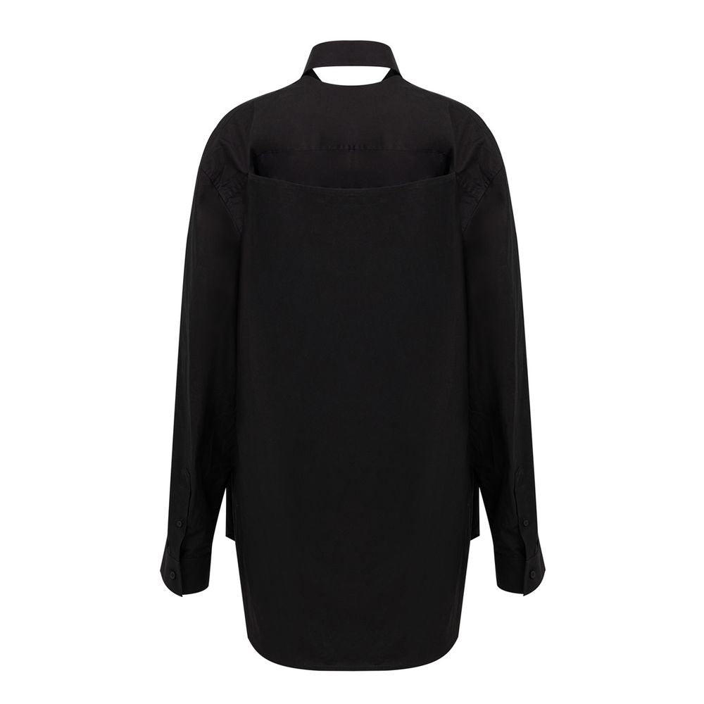 Robe longue noire en coton de Balenciaga, style élégant avec coupe fluide et détails modernes.