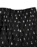 Pantalons larges noirs Dolce & Gabbana ornementés de cristaux brillants, élégants et sophistiqués, visibles en détail dans l'image.
