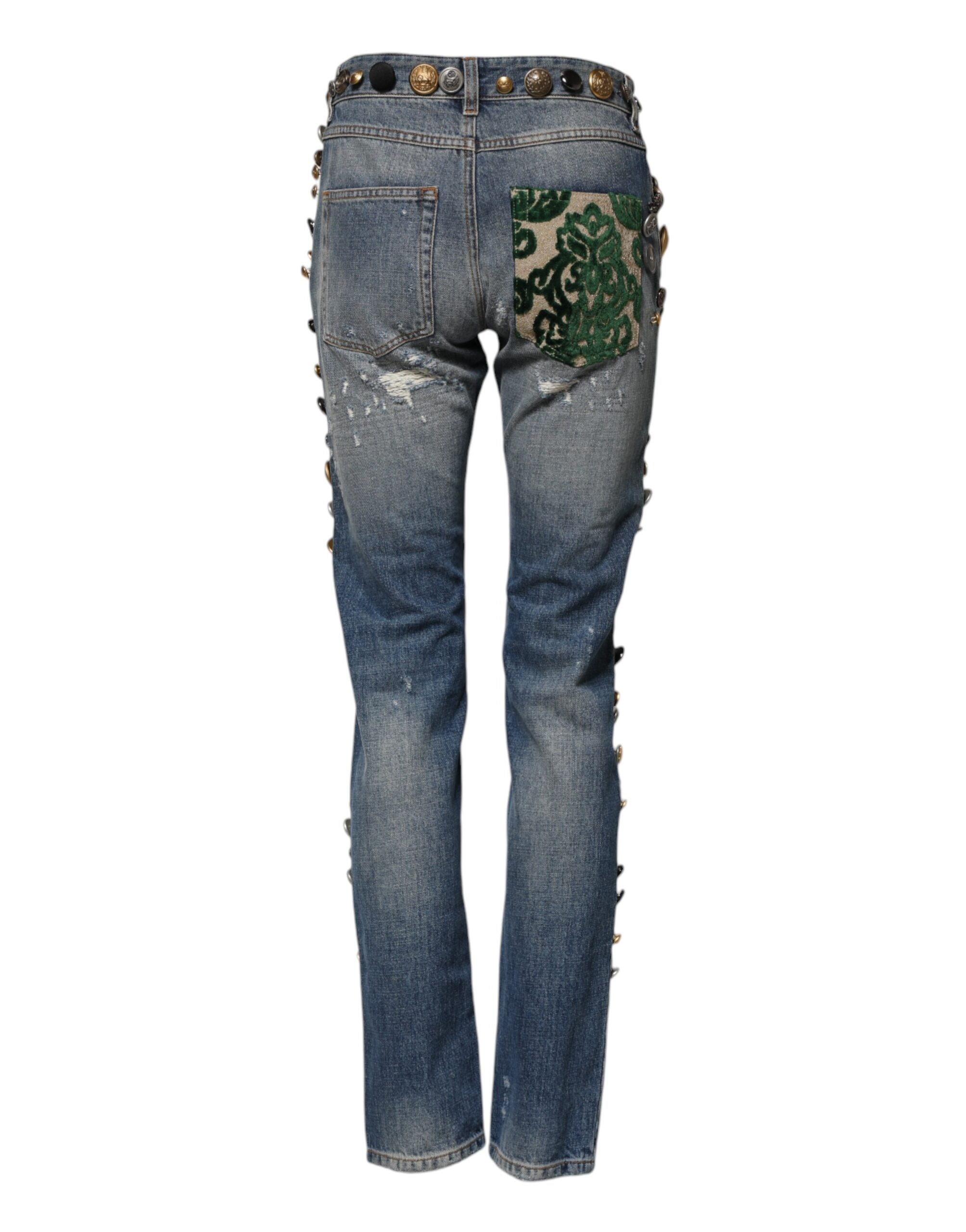 Jeans skinny en denim bleu Dolce & Gabbana avec embellissements et déchirures, style tattered, pour un look tendance.