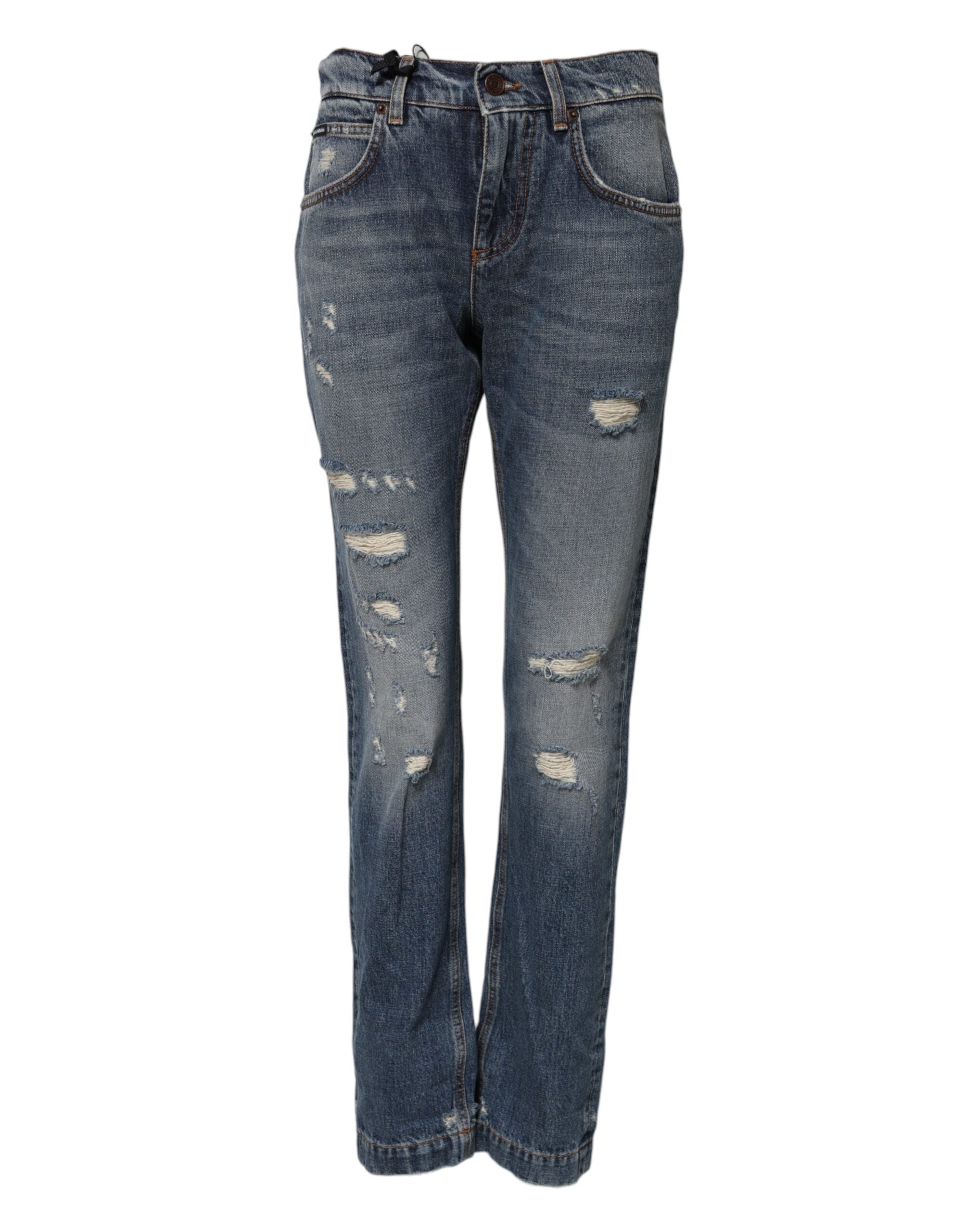 Jeans en denim coton bleu Dolce & Gabbana, taille mi-haute avec déchirures et style décontracté, visibles sur l’image.