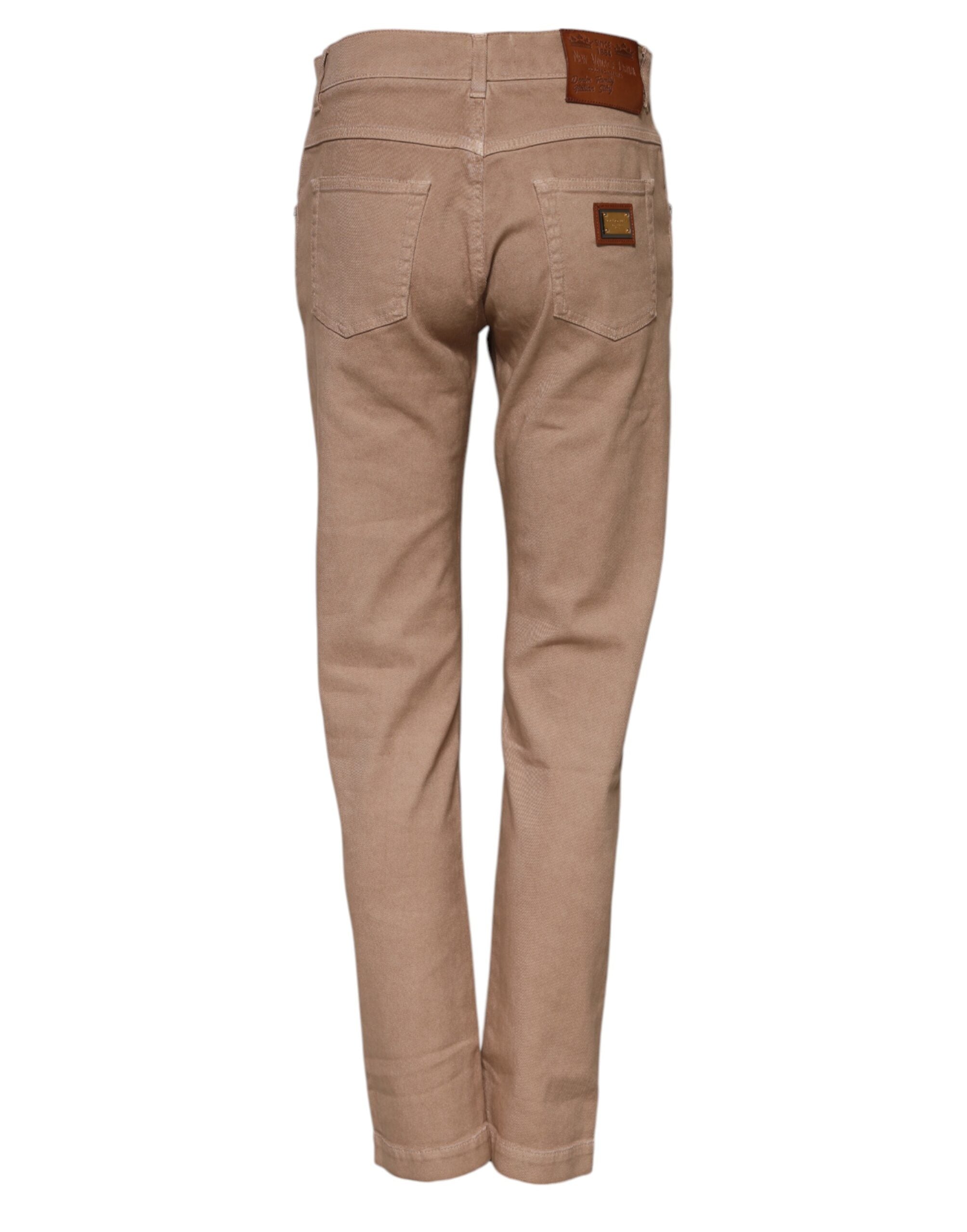 Pantalons jeans boyfriend en coton marron Dolce & Gabbana, coupe décontractée et style mode, visible sur le mannequin.