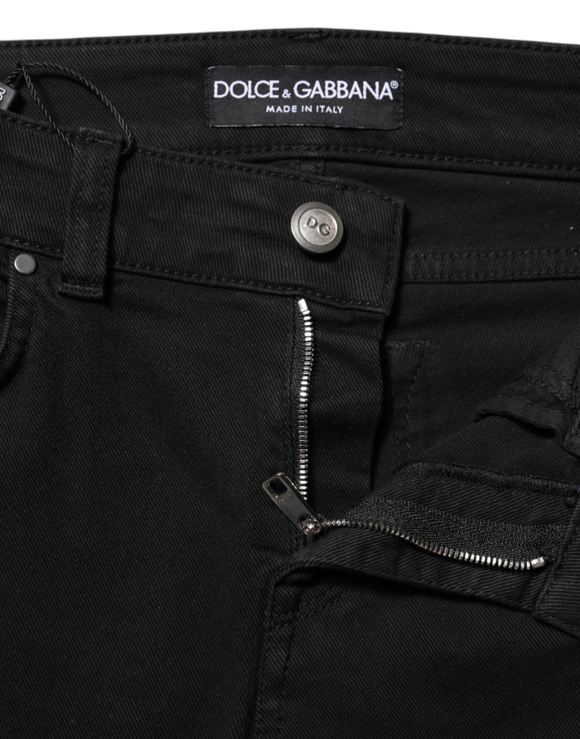 Jeans skinny en coton noir à taille mi-fesse de Dolce & Gabbana, denim ajusté et élégant.
