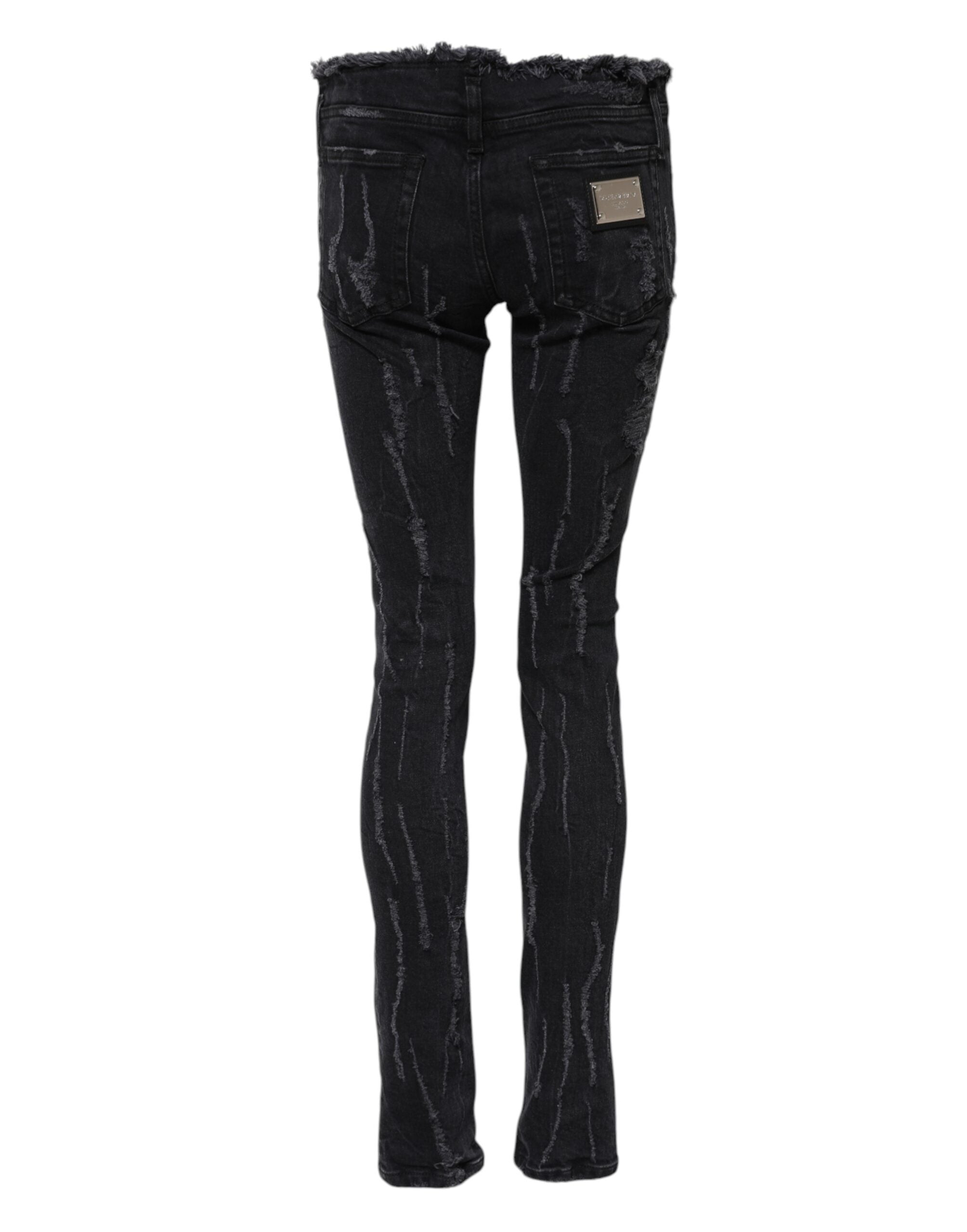 Jeans skinny en coton noir Dolce & Gabbana avec déchirures, style tattered, ajustés et tendance.